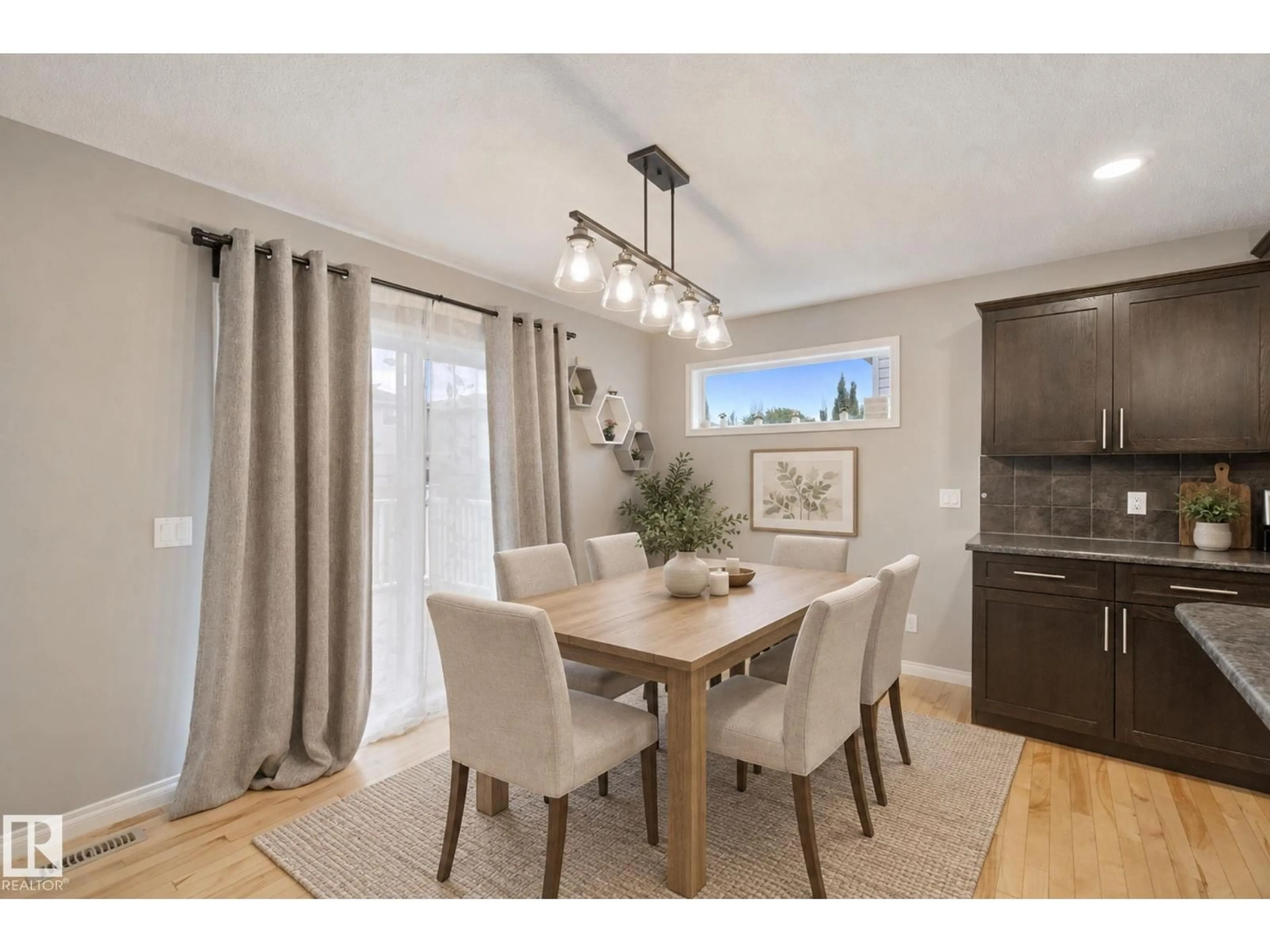 Dining room, wood/laminate floor for 628 FOXTAIL LN, Sherwood Park Alberta T8A4P2