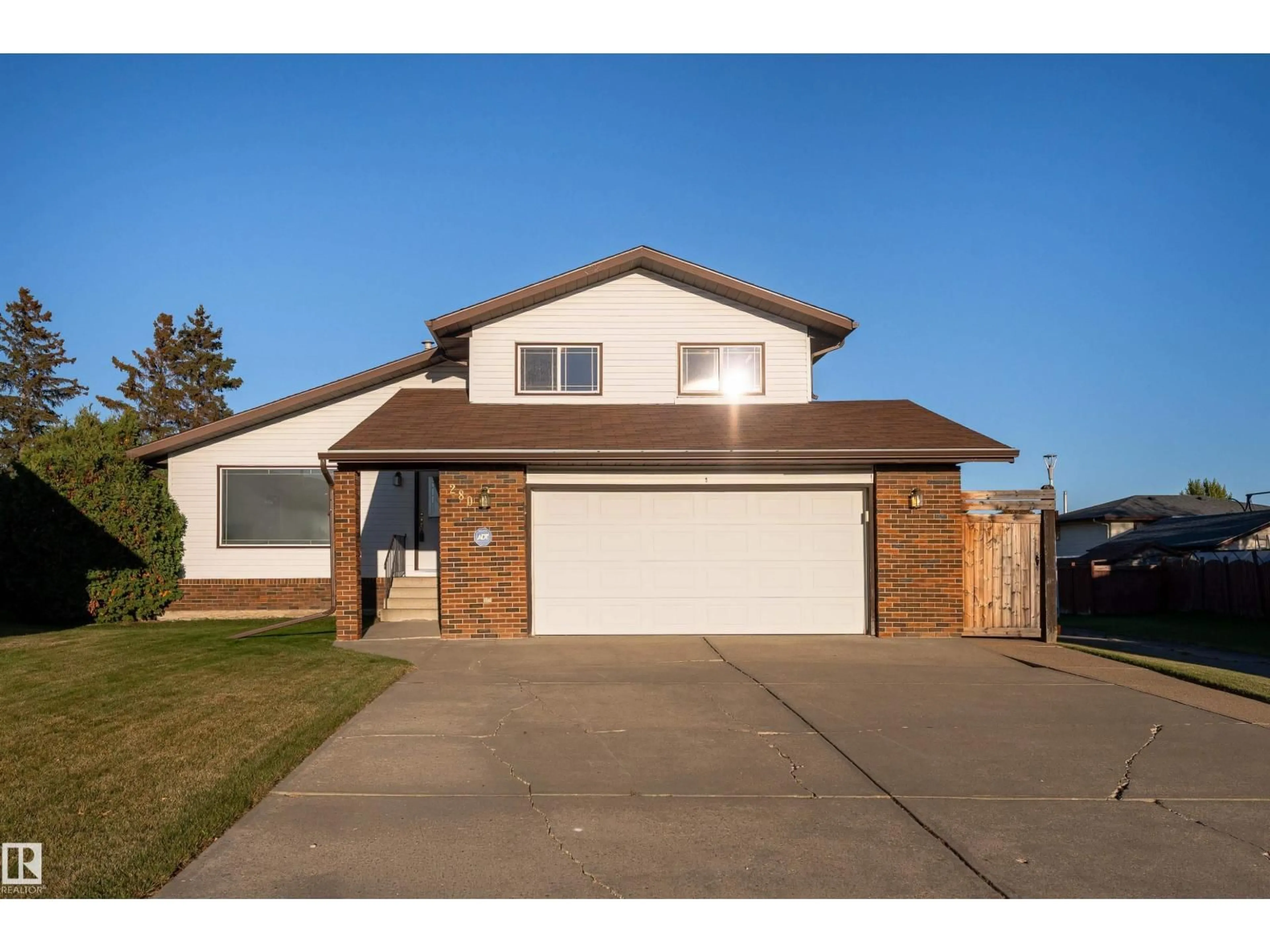 Home with vinyl exterior material, street for 280 WARWICK RD, Edmonton Alberta T5X4P9