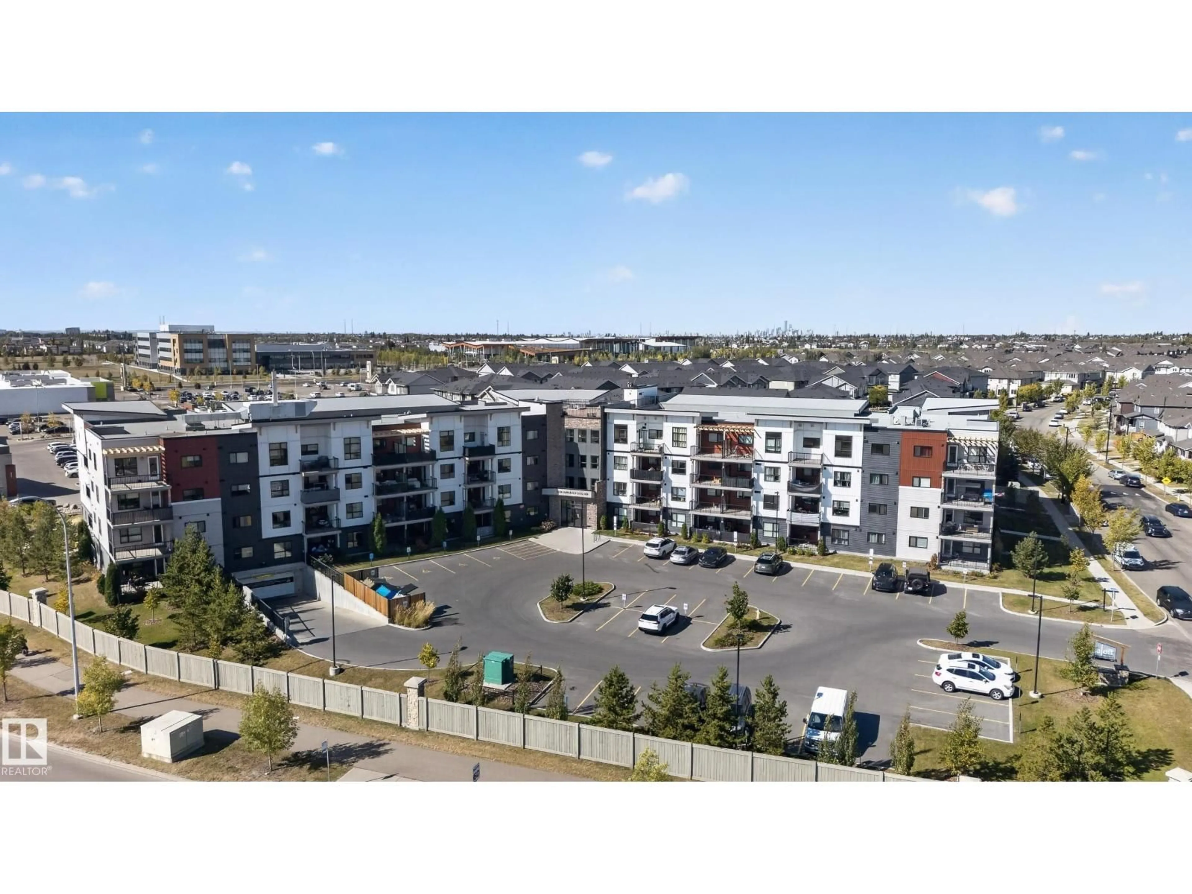A pic from outside/outdoor area/front of a property/back of a property/a pic from drone, unknown for 205 - 1506 TAMARACK BV, Edmonton Alberta T6T2J5