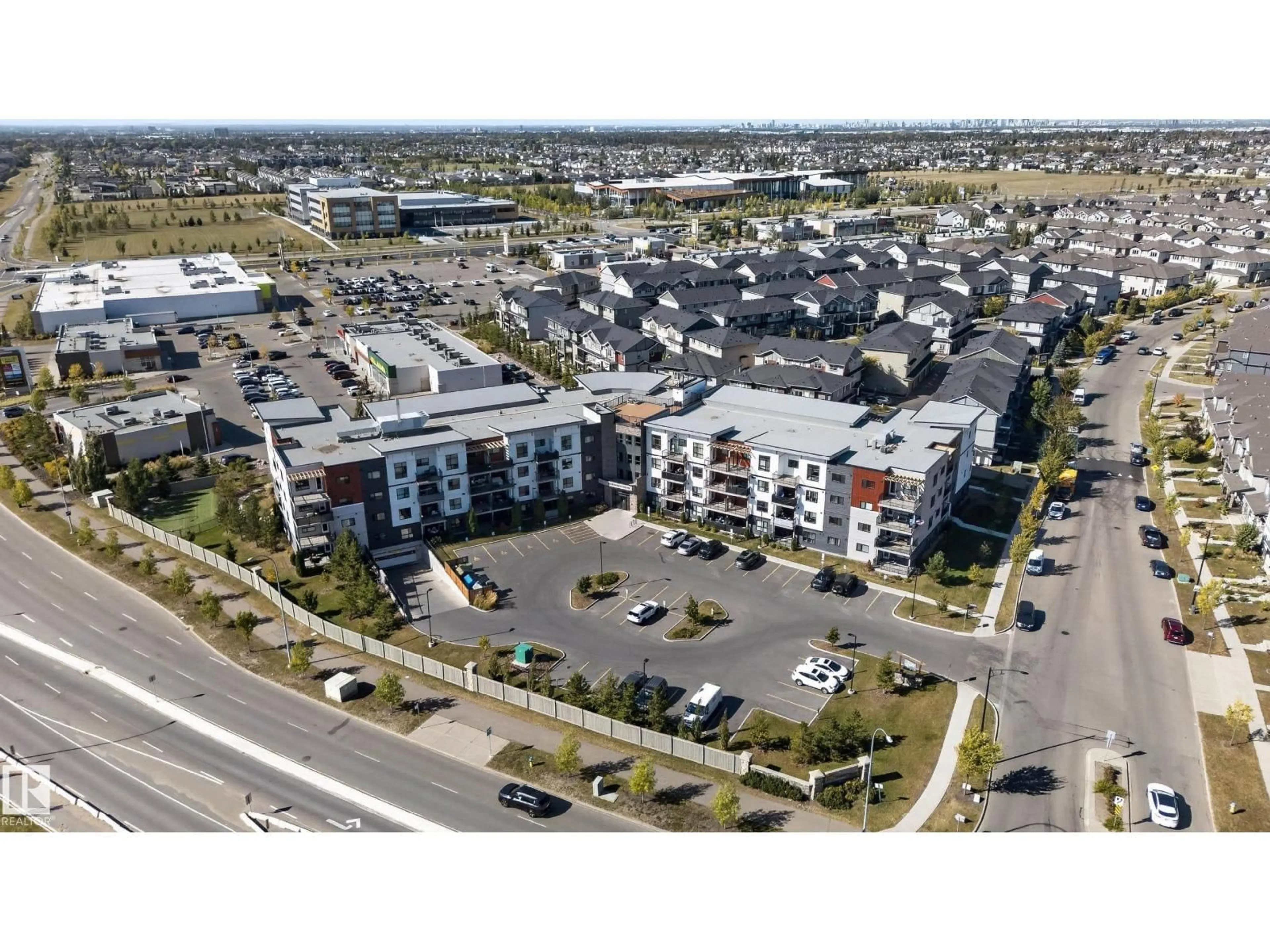 A pic from outside/outdoor area/front of a property/back of a property/a pic from drone, street for 205 - 1506 TAMARACK BV, Edmonton Alberta T6T2J5