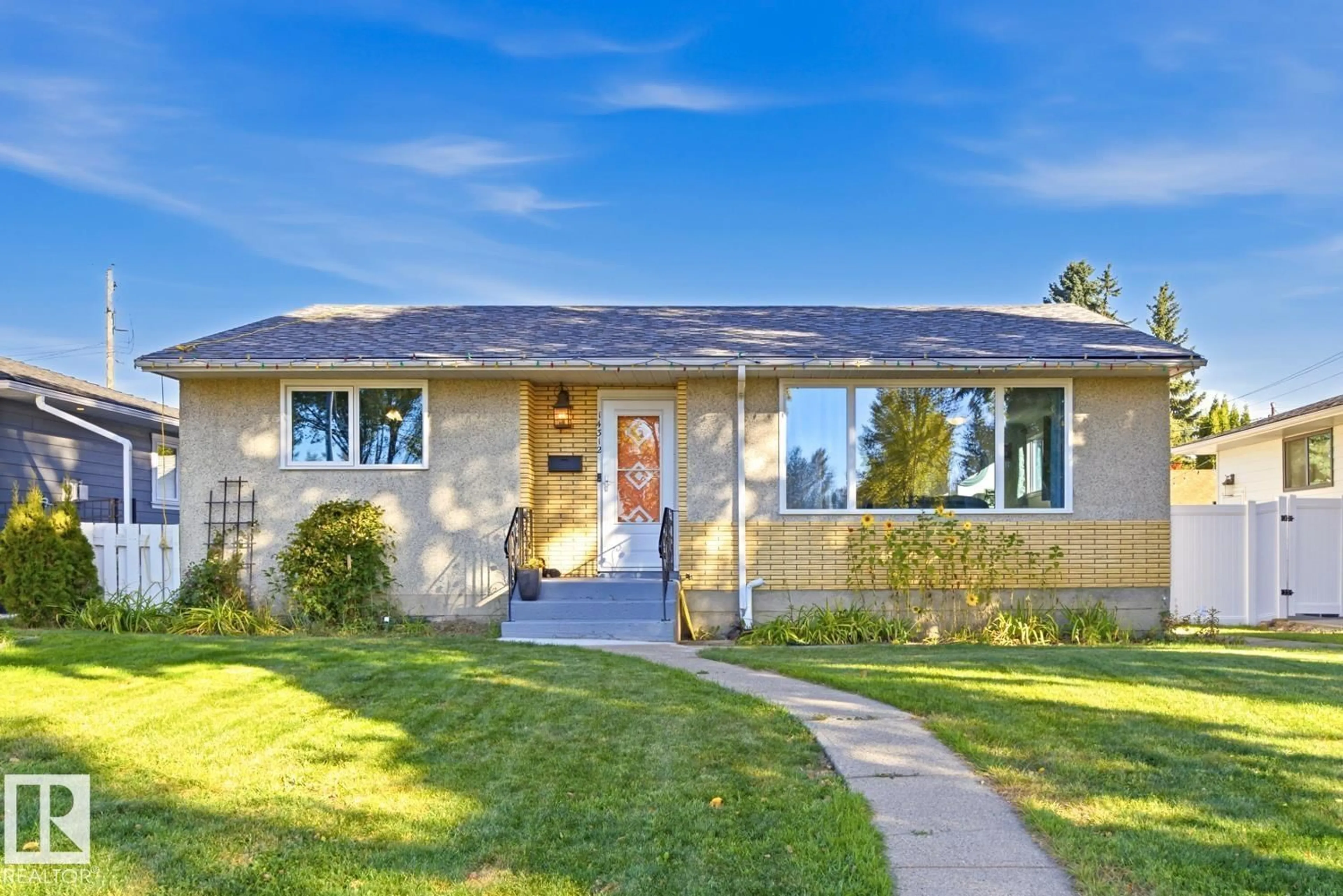 Home with vinyl exterior material, street for NW - 14312 89A AV, Edmonton Alberta T5R4S7