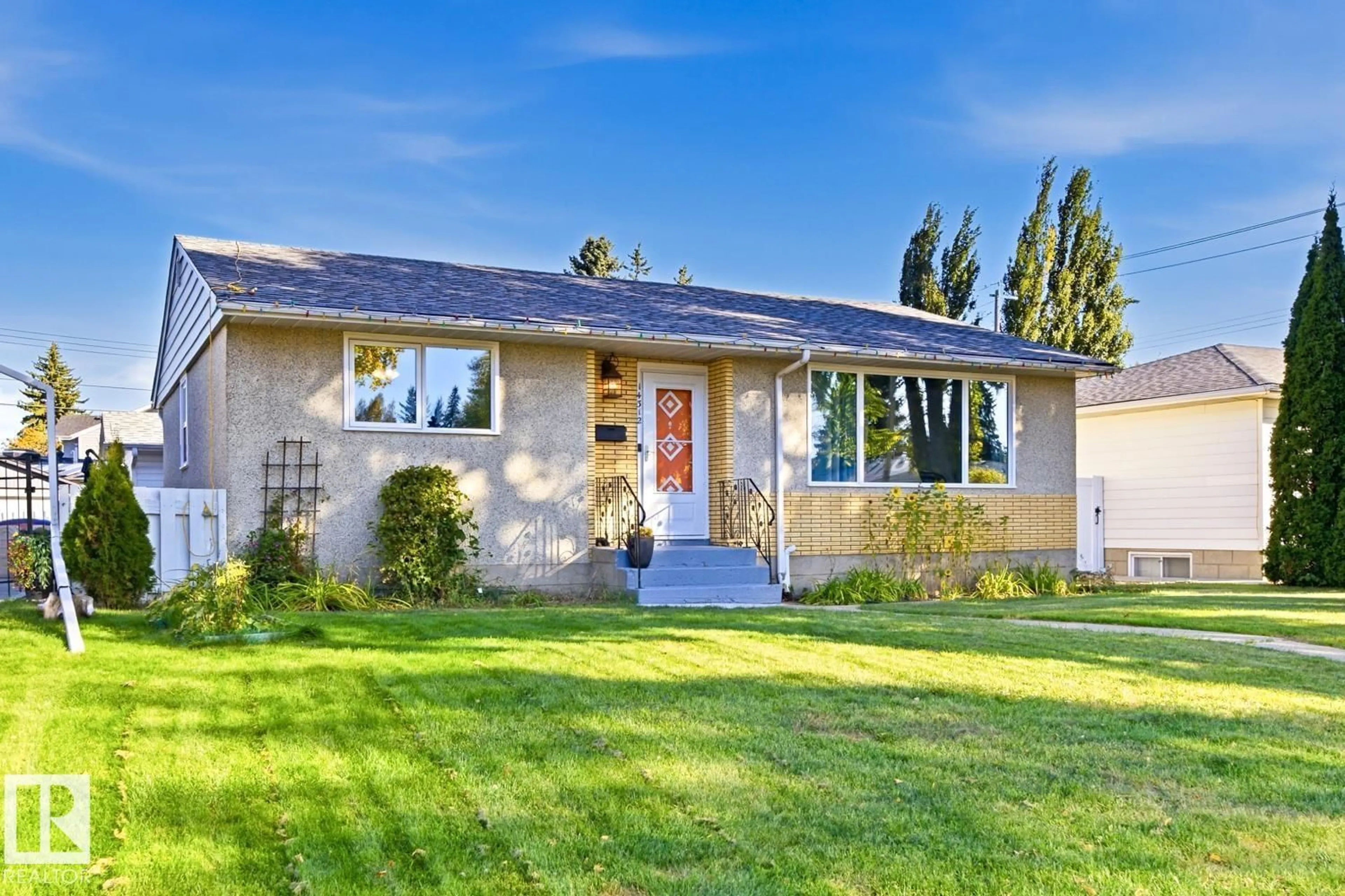 Home with vinyl exterior material, street for NW - 14312 89A AV, Edmonton Alberta T5R4S7