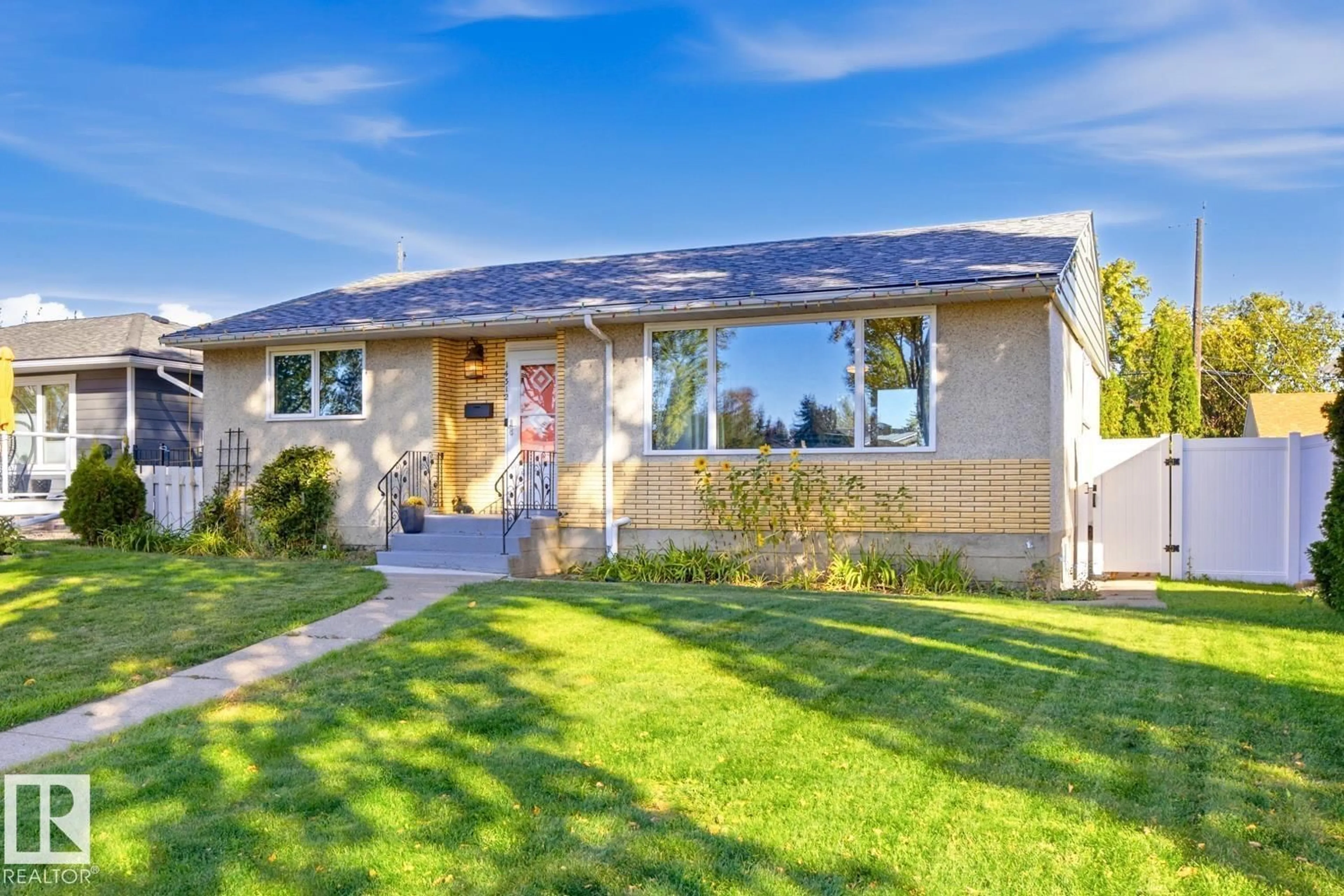 Home with vinyl exterior material, street for NW - 14312 89A AV, Edmonton Alberta T5R4S7