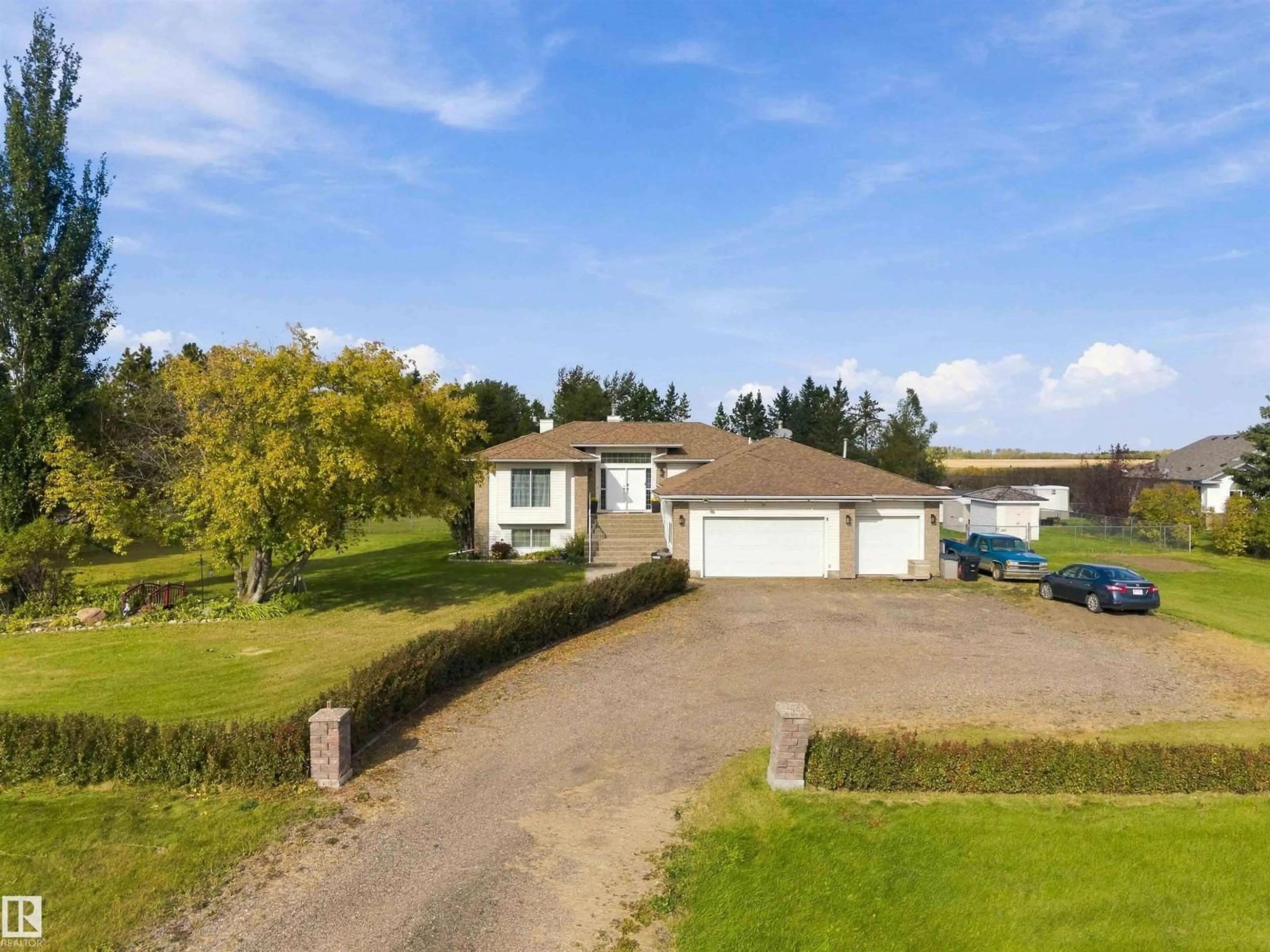 A pic from outside/outdoor area/front of a property/back of a property/a pic from drone, street for 16 RGE RD 230, Rural Sturgeon County Alberta T0A1N2