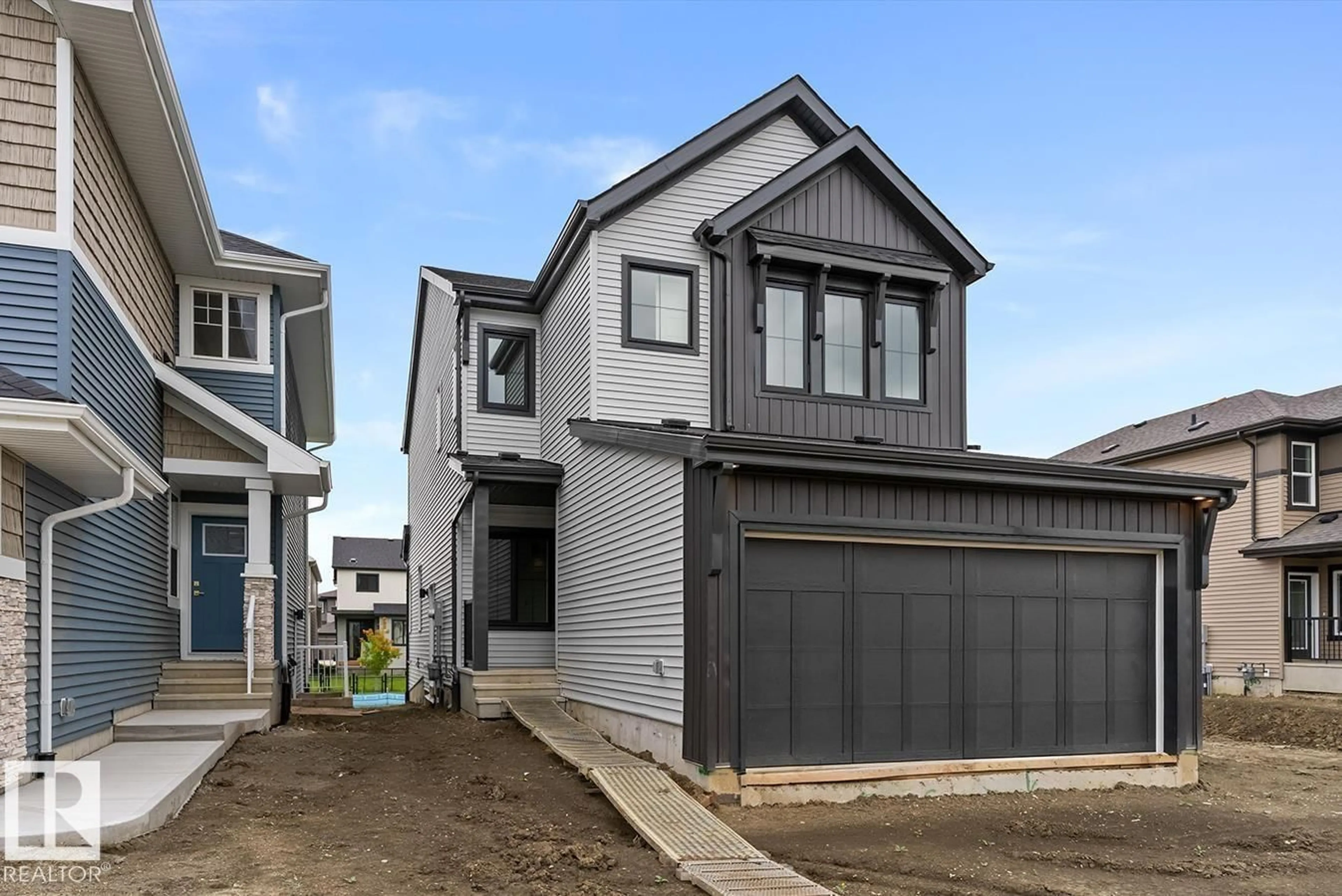 Home with vinyl exterior material, street for SW - 5035 CAWSEY LI, Edmonton Alberta T6W5G5