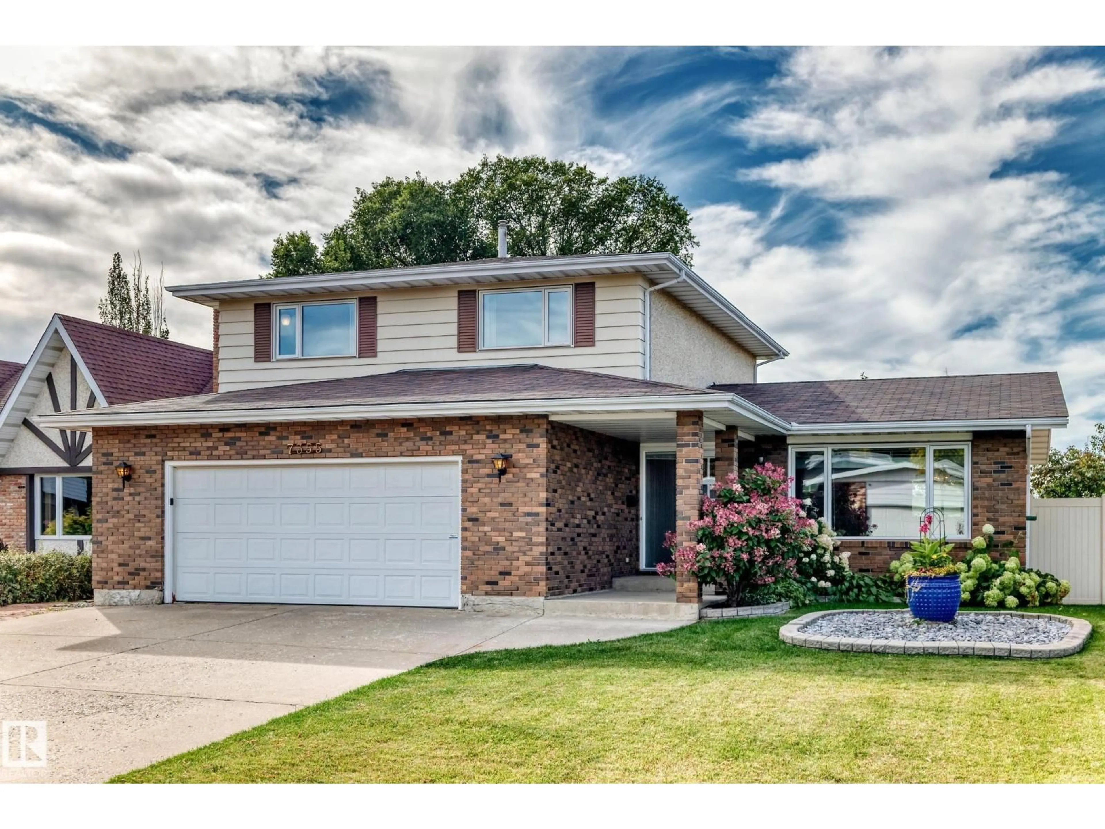 Home with vinyl exterior material, street for 7355 18 AV, Edmonton Alberta T6K2B5