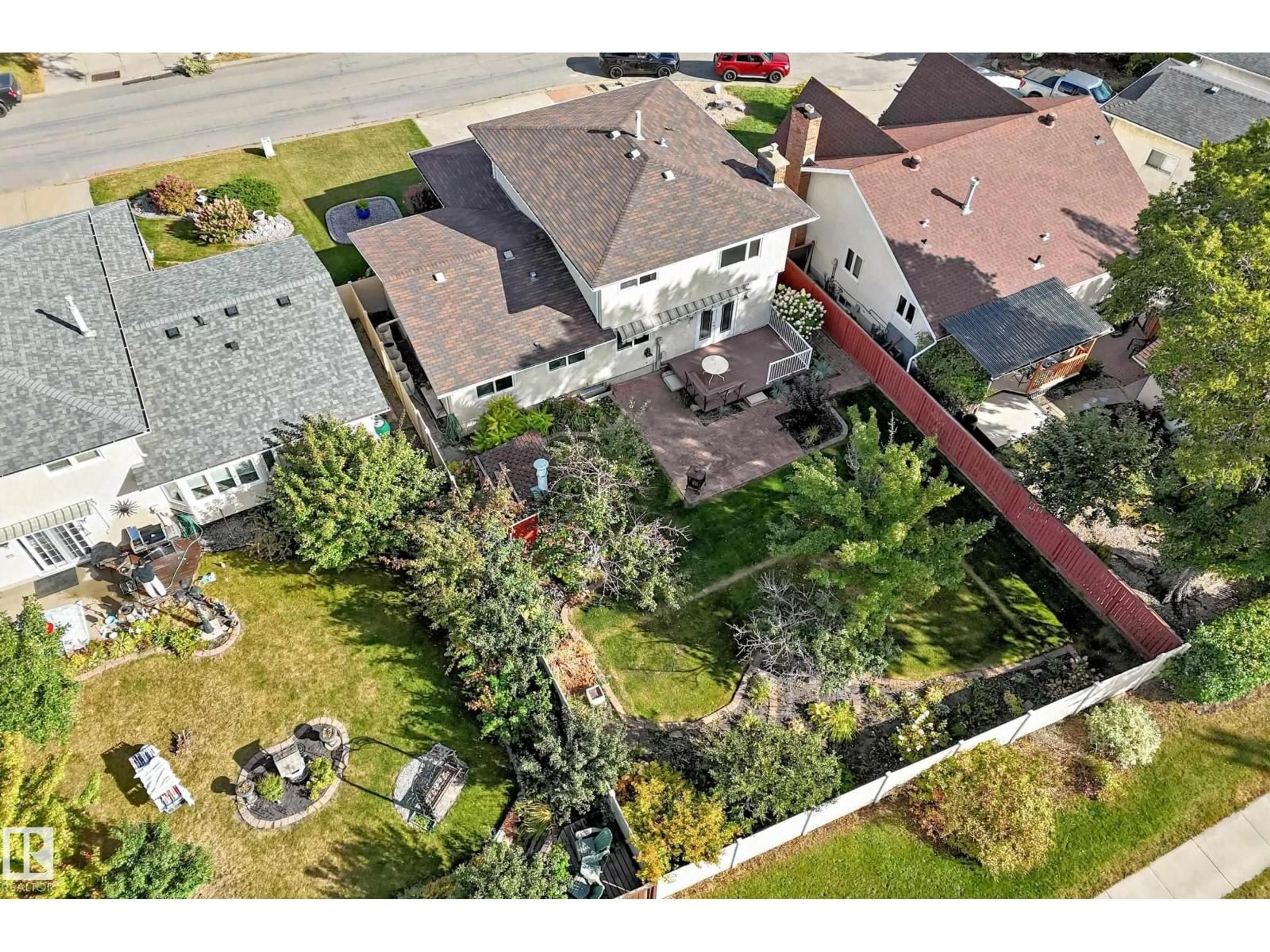 A pic from outside/outdoor area/front of a property/back of a property/a pic from drone, street for 7355 18 AV, Edmonton Alberta T6K2B5