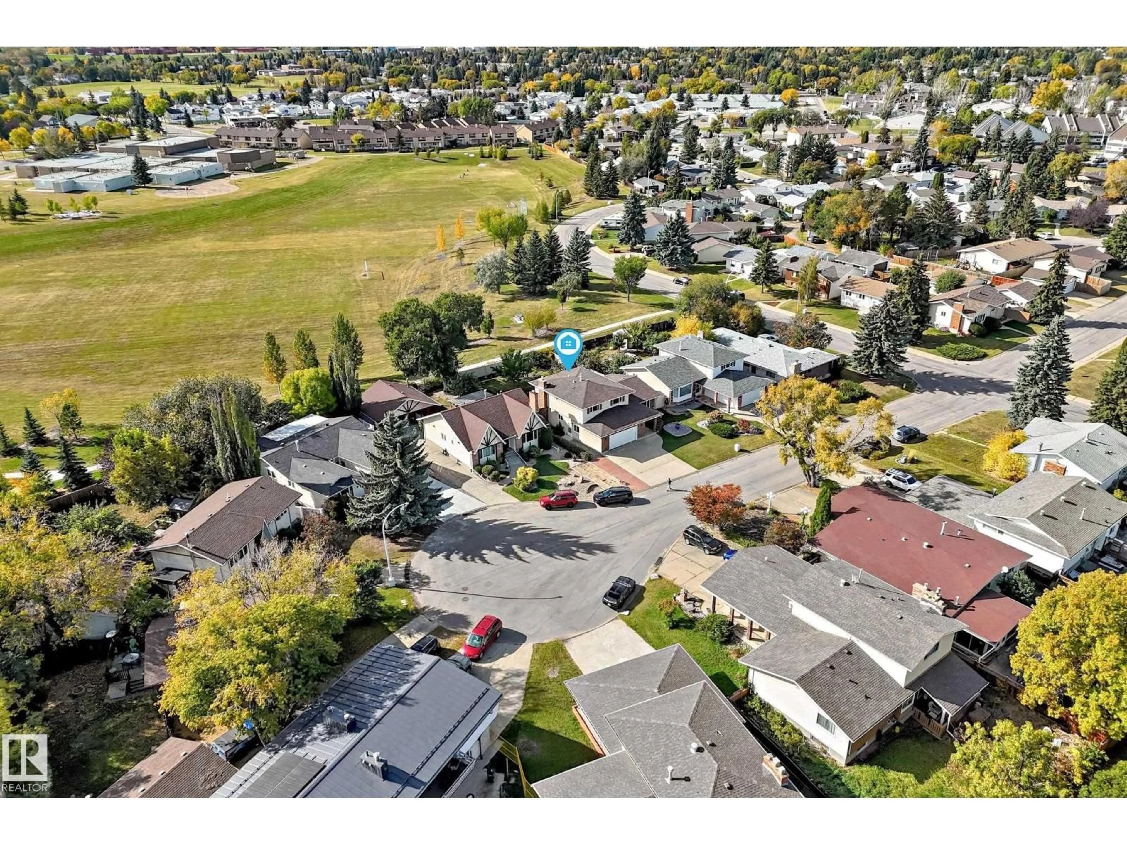 A pic from outside/outdoor area/front of a property/back of a property/a pic from drone, street for 7355 18 AV, Edmonton Alberta T6K2B5
