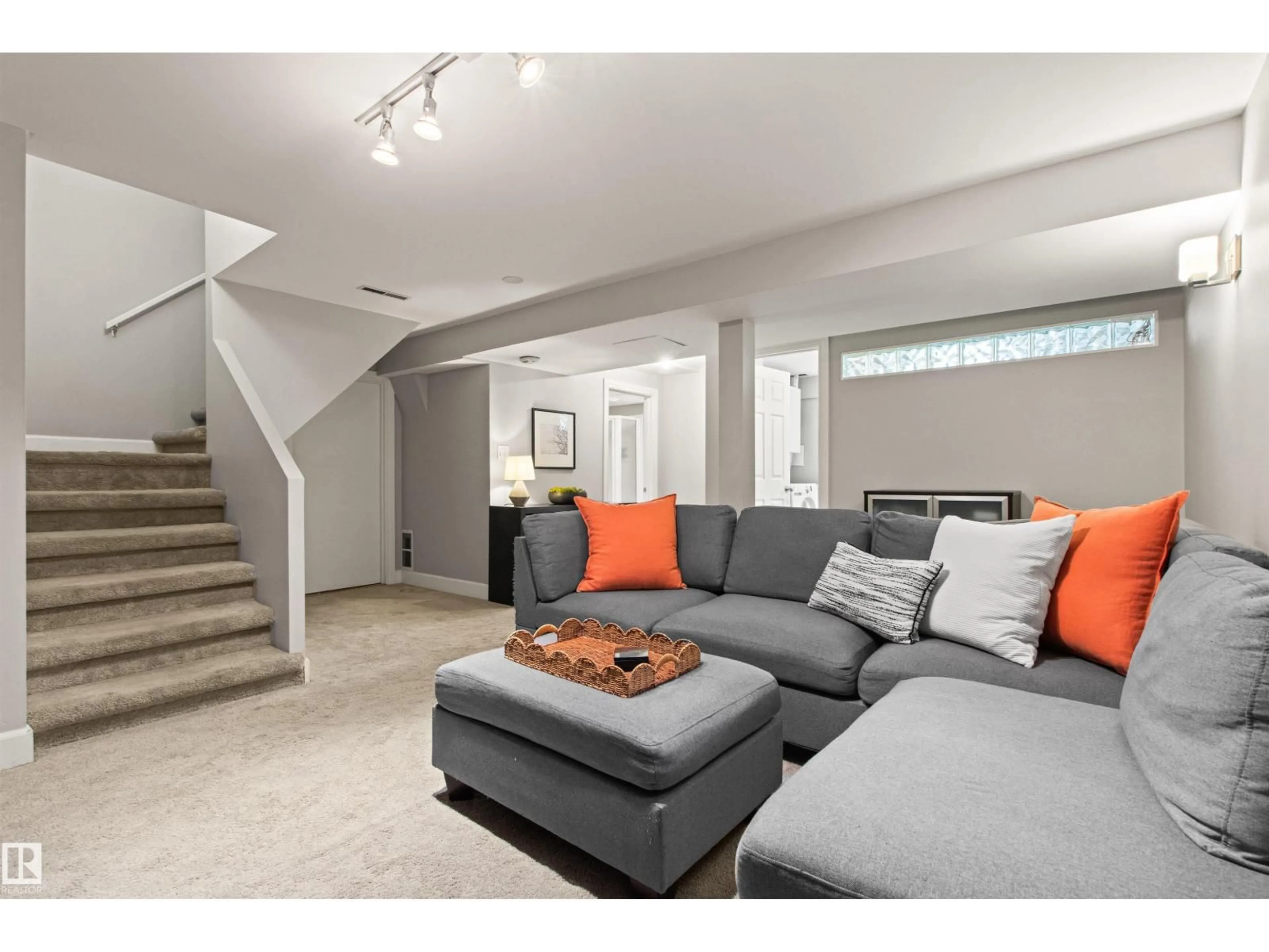 Living room with furniture, unknown for 10741 70 AV, Edmonton Alberta T6H2G4
