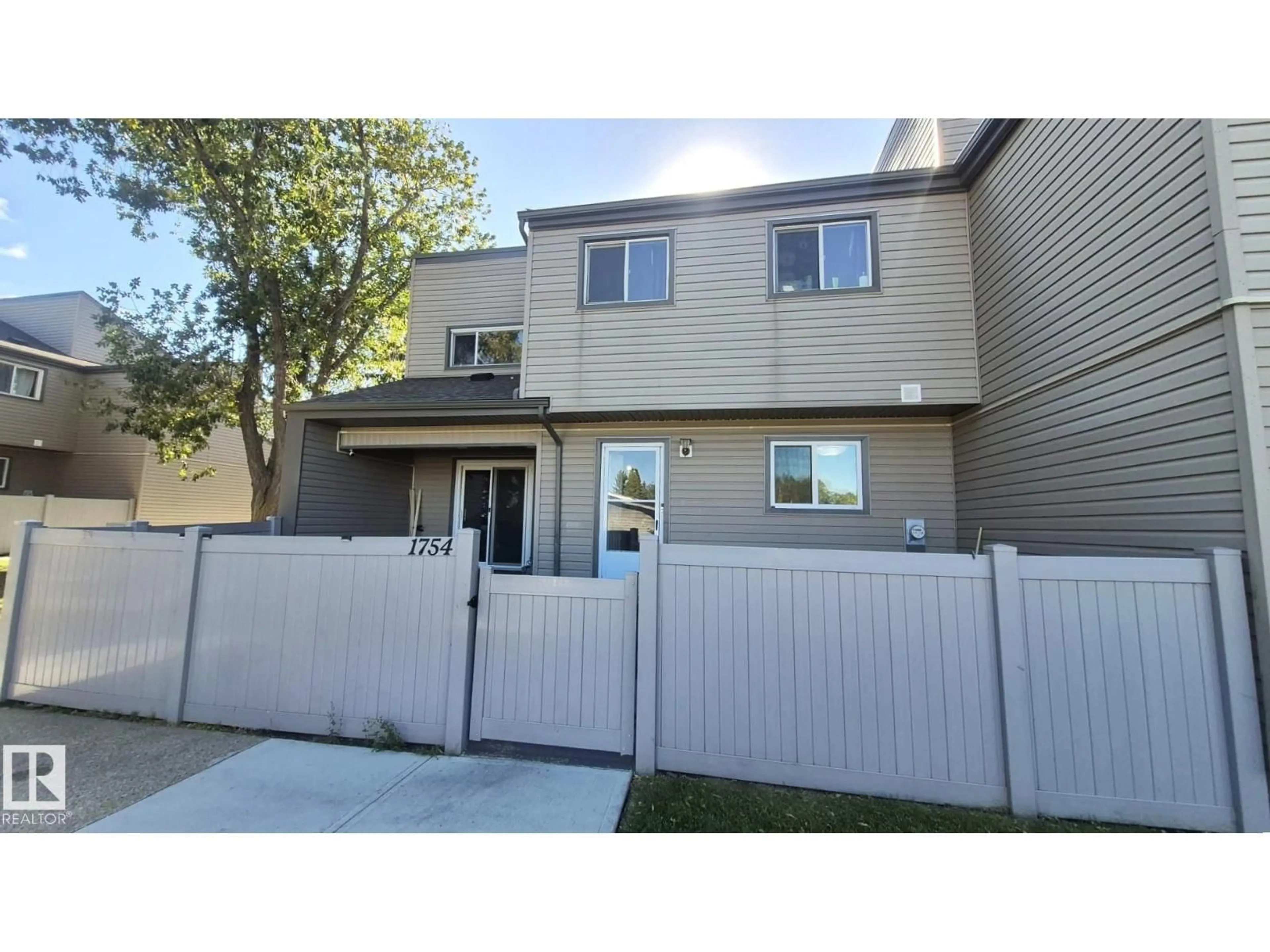 Home with vinyl exterior material, street for 1754 LAKEWOOD RD, Edmonton Alberta T6K3B6