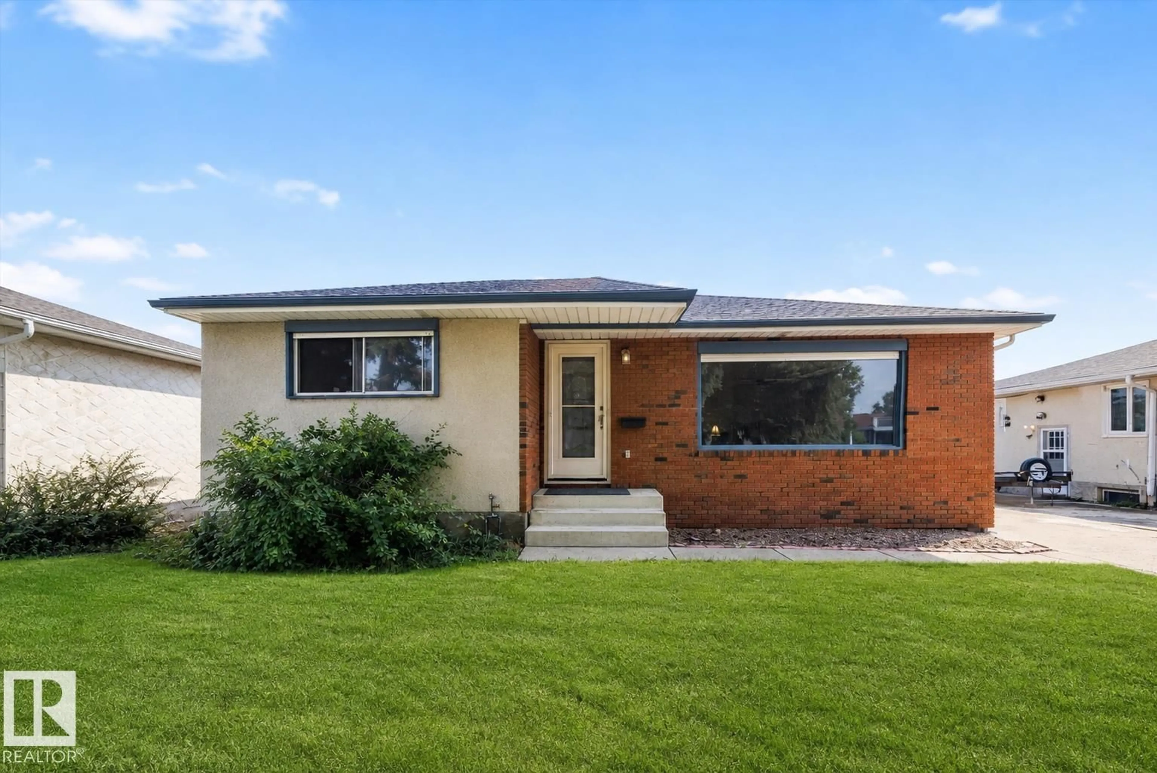 Home with brick exterior material, street for 3511 73 ST, Edmonton Alberta T6K0M2