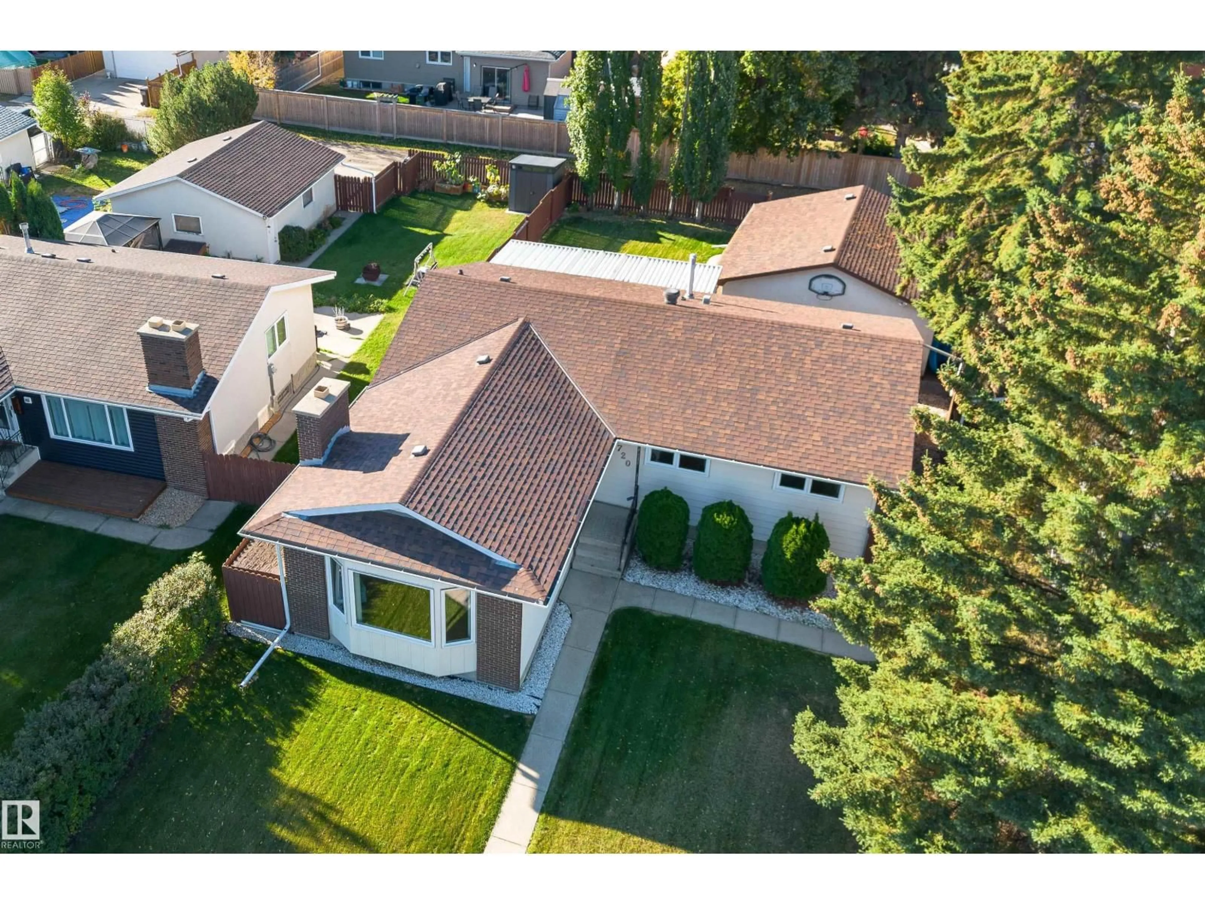 A pic from outside/outdoor area/front of a property/back of a property/a pic from drone, street for 720 KNOTTWOOD RD S, Edmonton Alberta T6K1W5