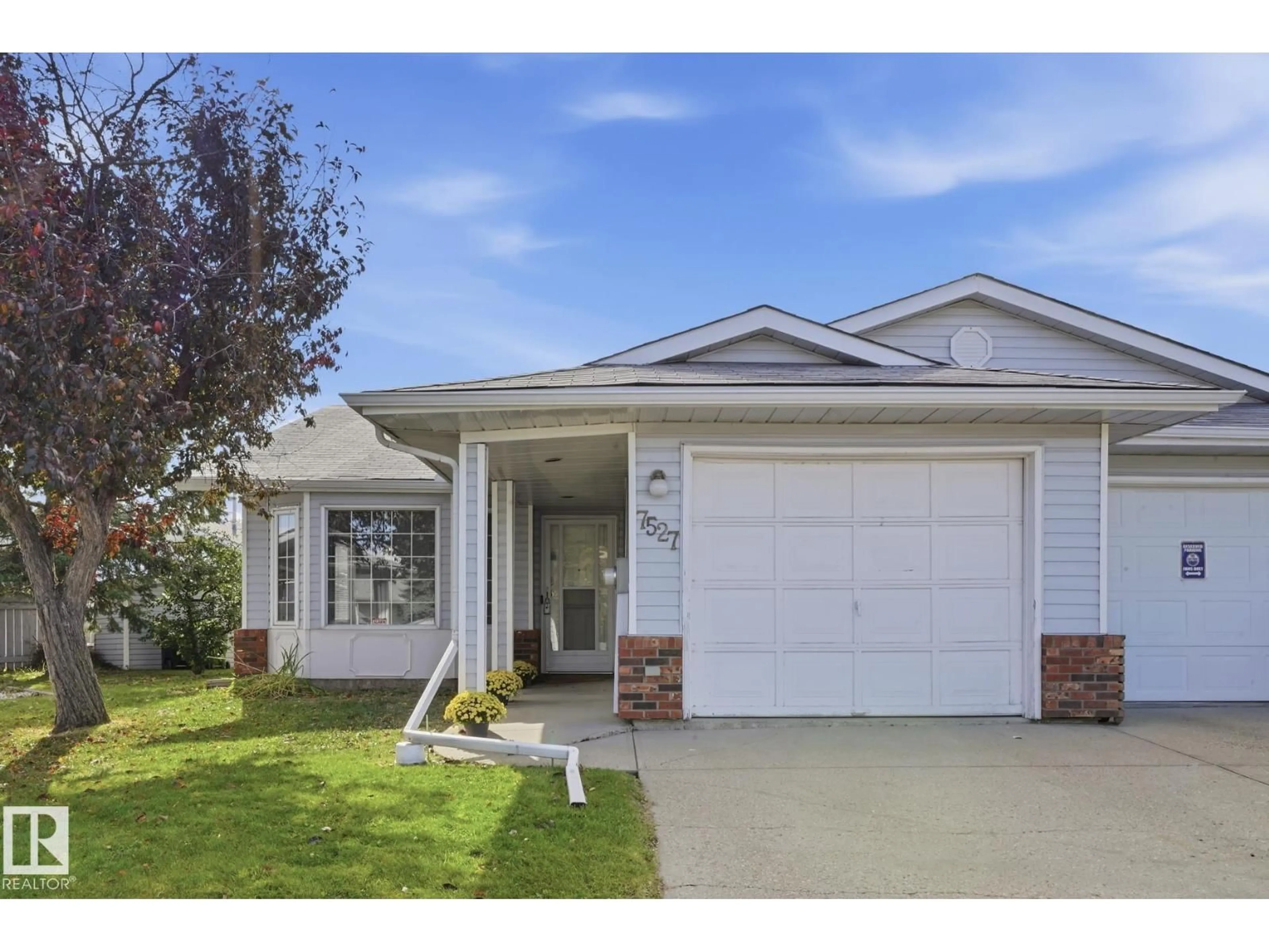 Home with vinyl exterior material, street for 7527 138A AV, Edmonton Alberta T5C3R2