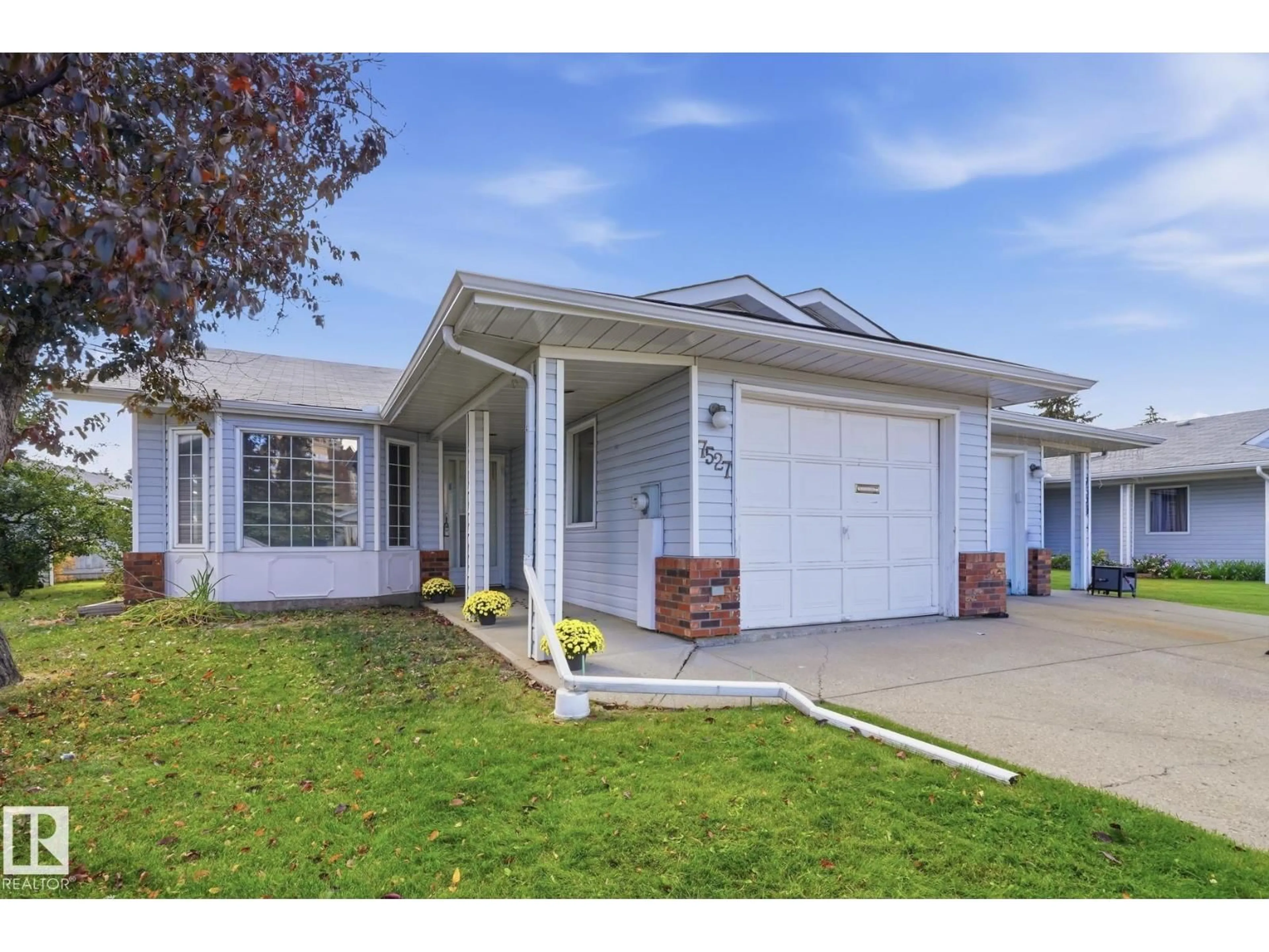 Home with vinyl exterior material, street for 7527 138A AV, Edmonton Alberta T5C3R2
