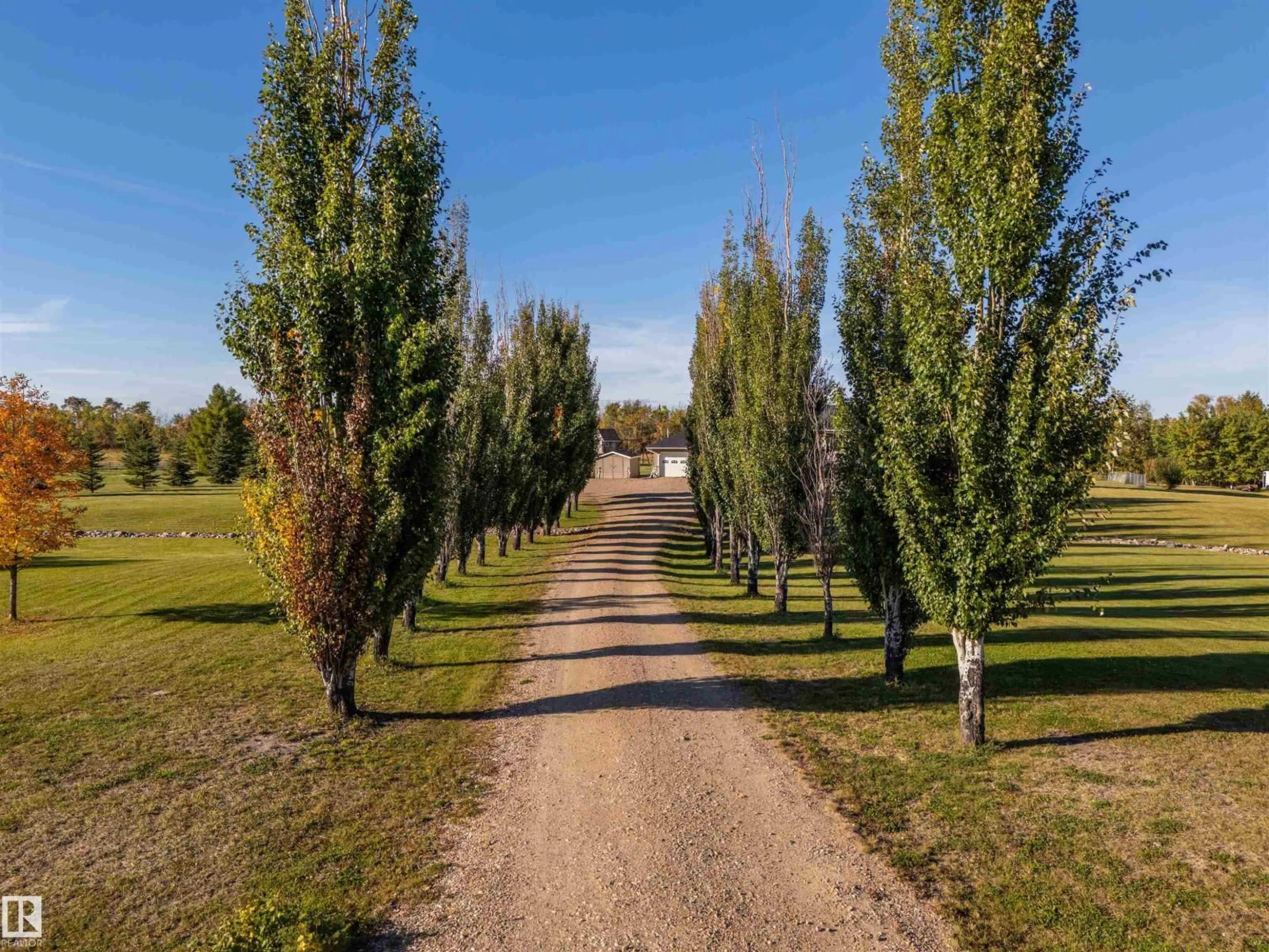 A pic from outside/outdoor area/front of a property/back of a property/a pic from drone, forest/trees view for #6 - 61130 RR 465, Rural Bonnyville M.D. Alberta T9N2G8