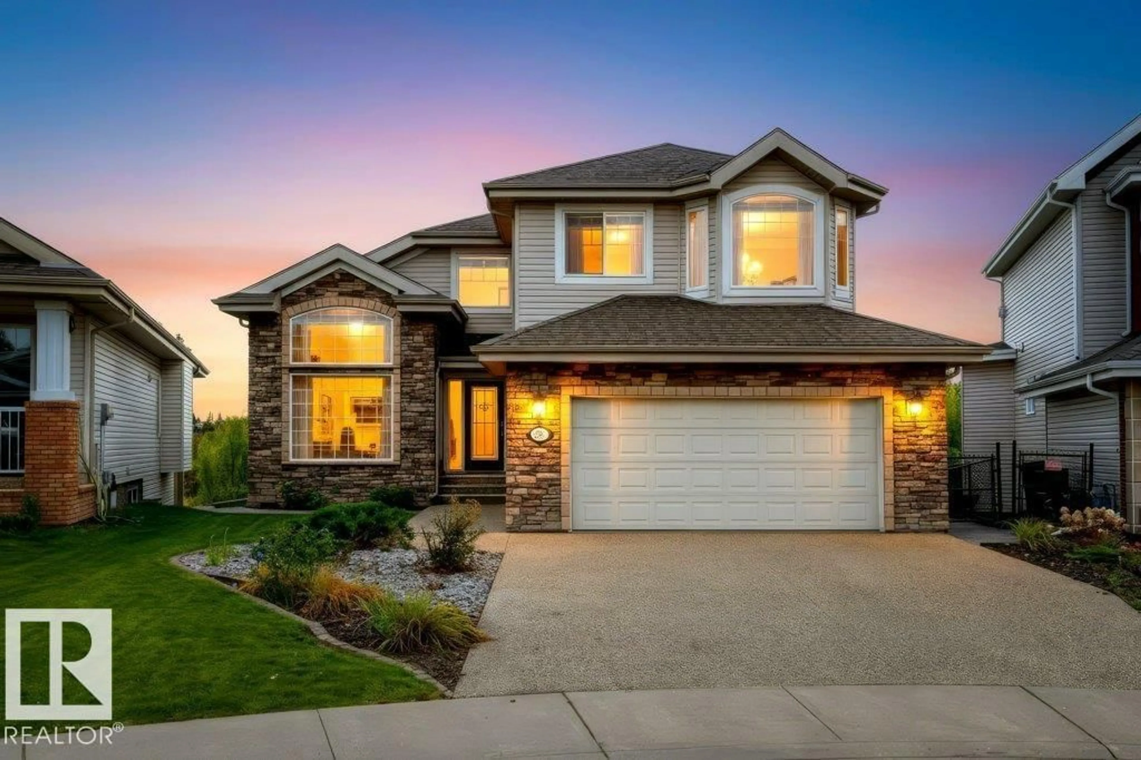Home with brick exterior material, street for 858 HODGINS RD, Edmonton Alberta T6M0K8