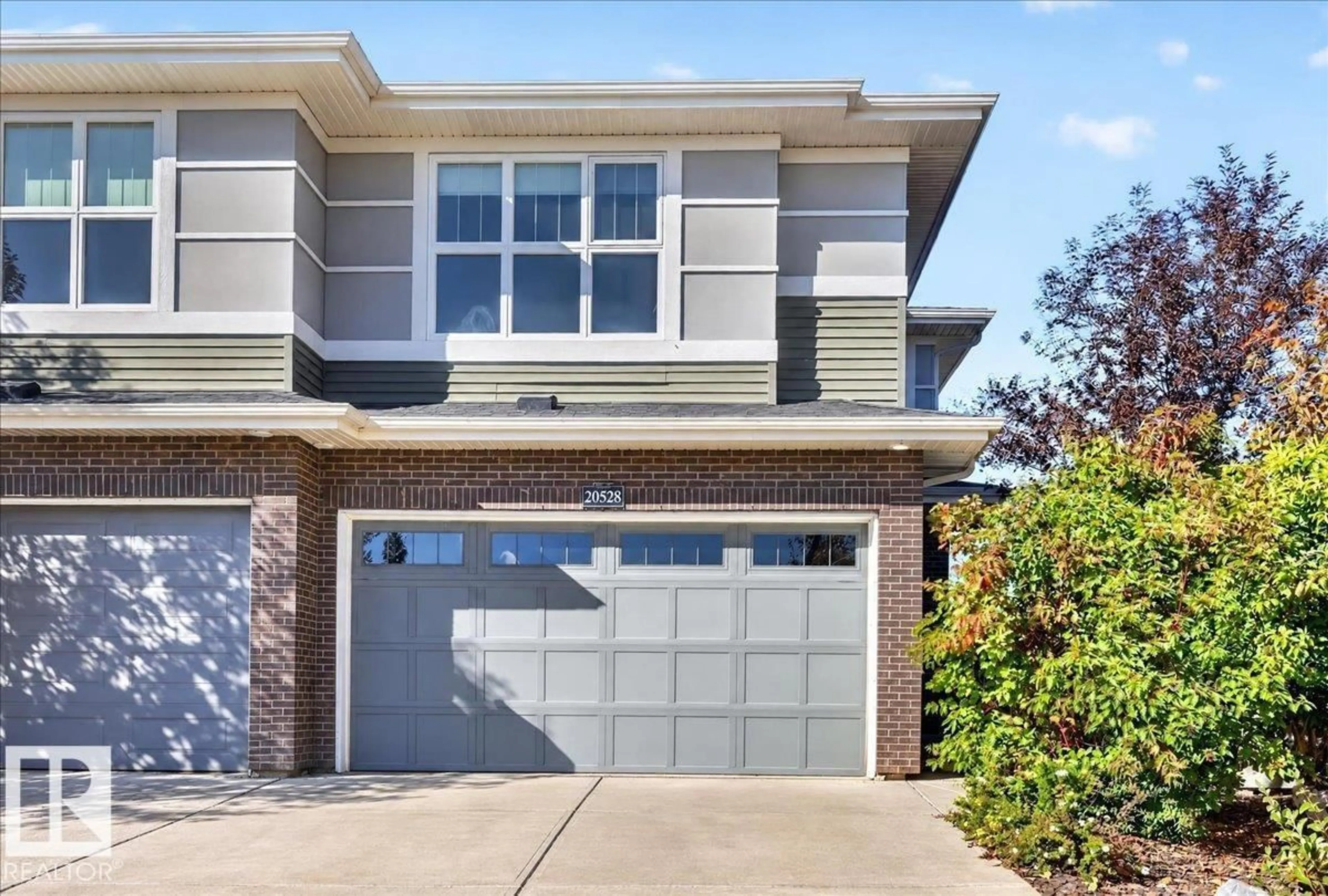 Home with brick exterior material, street for 20528 128 AV, Edmonton Alberta T5S0L8