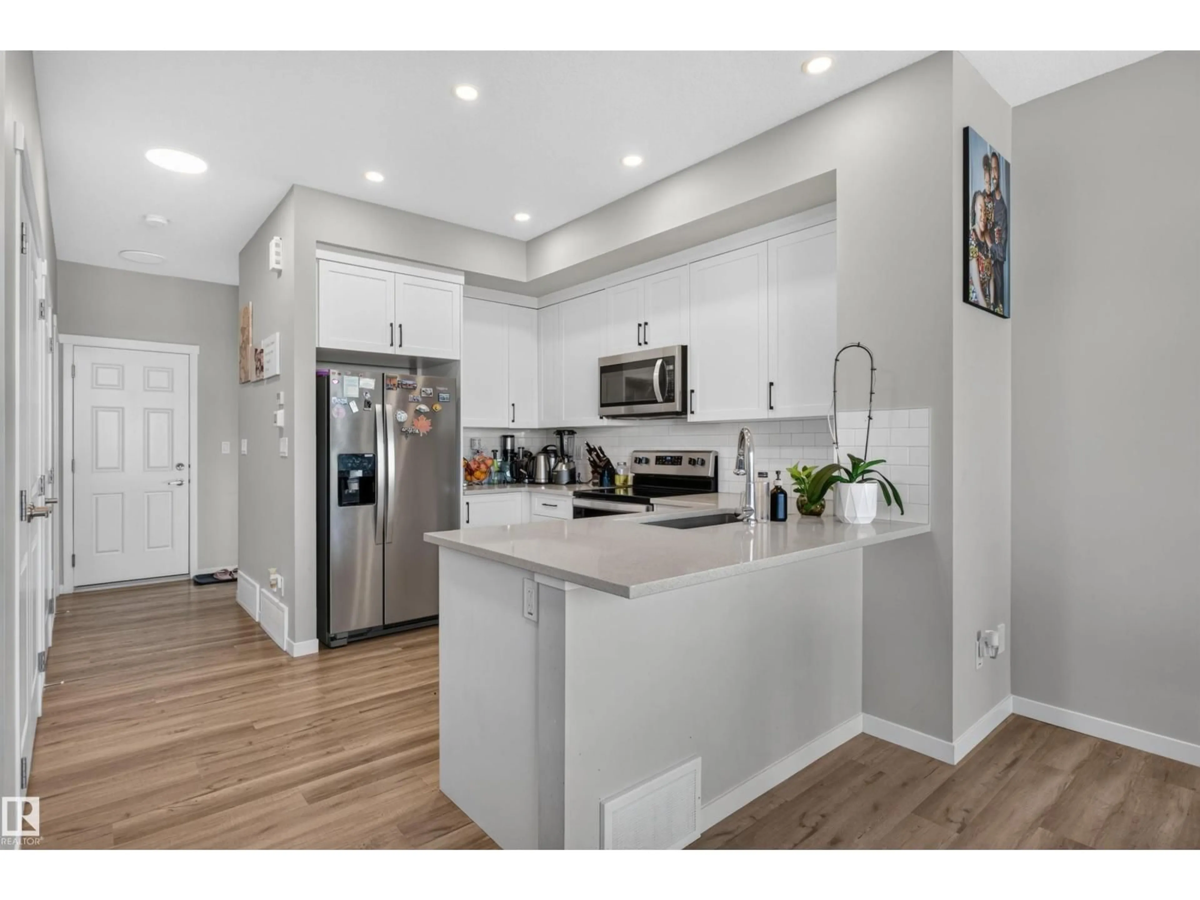 Open concept kitchen, unknown for NW - 15150 26 ST, Edmonton Alberta T5Y3Y5