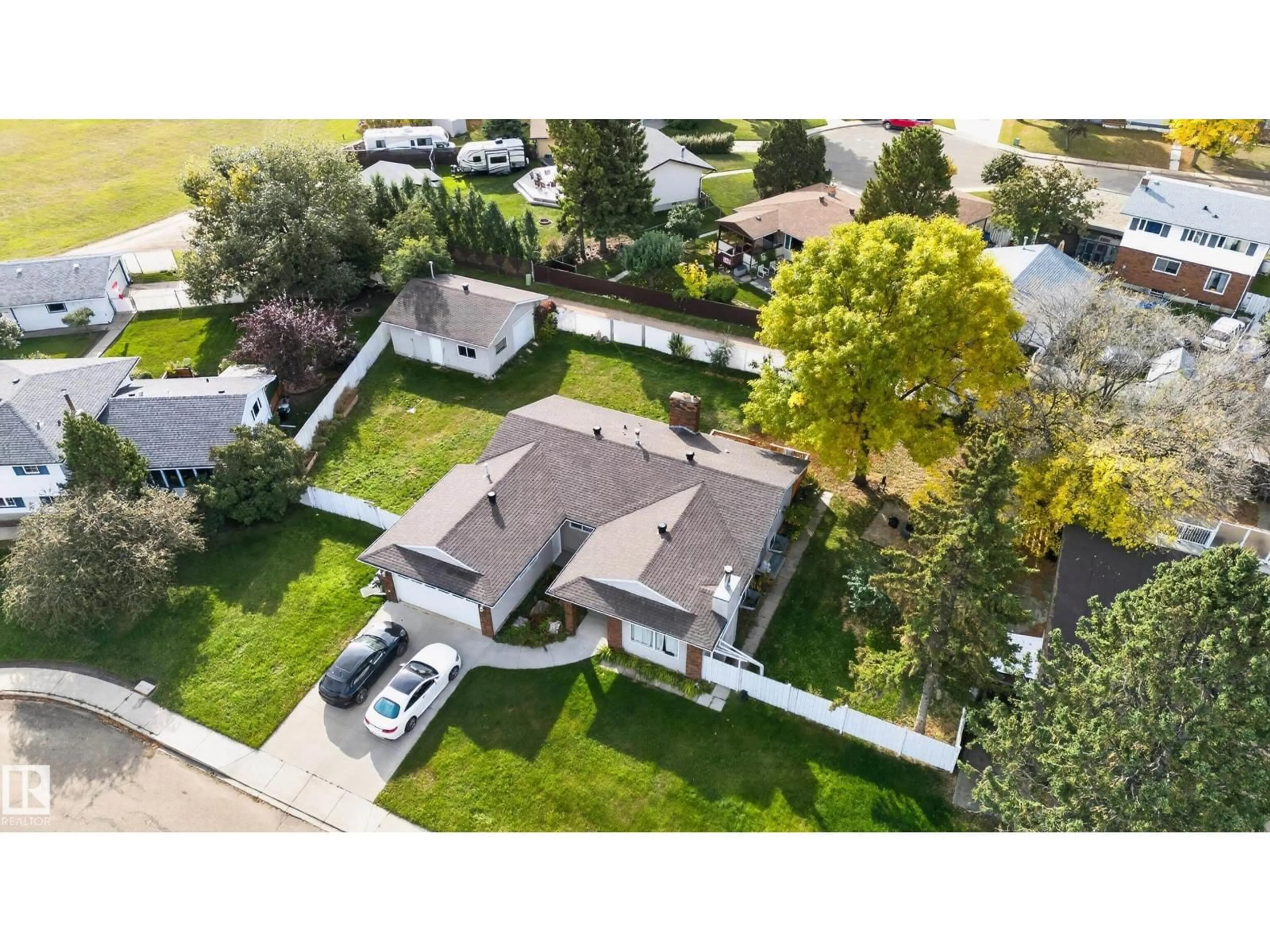A pic from outside/outdoor area/front of a property/back of a property/a pic from drone, street for 109 EVERGREEN CR, Wetaskiwin Alberta T9A2C9