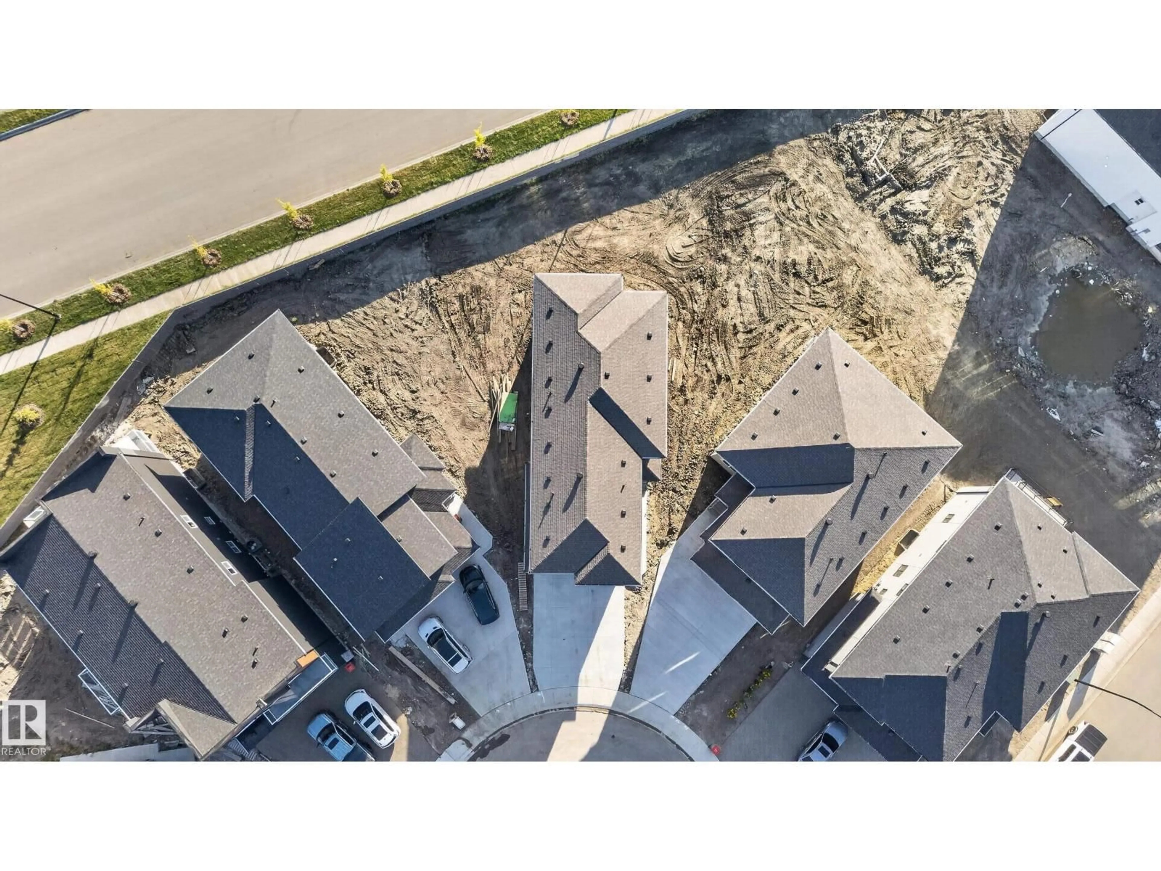 A pic from outside/outdoor area/front of a property/back of a property/a pic from drone, street for NE - 6320 24 ST, Rural Leduc County Alberta T6X3A6