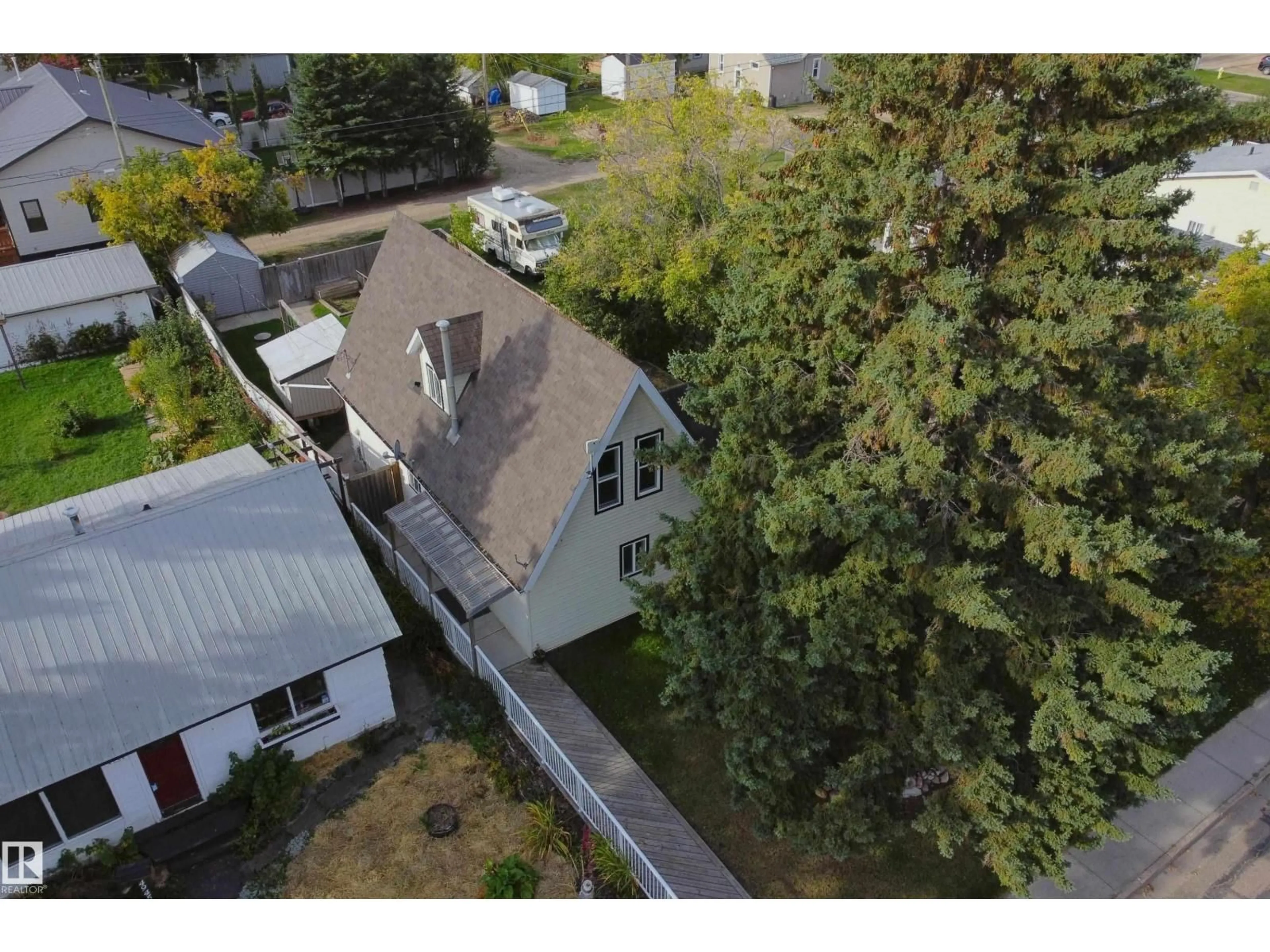 A pic from outside/outdoor area/front of a property/back of a property/a pic from drone, street for 4947 49 AVENUE, Barrhead Alberta T7N1G6