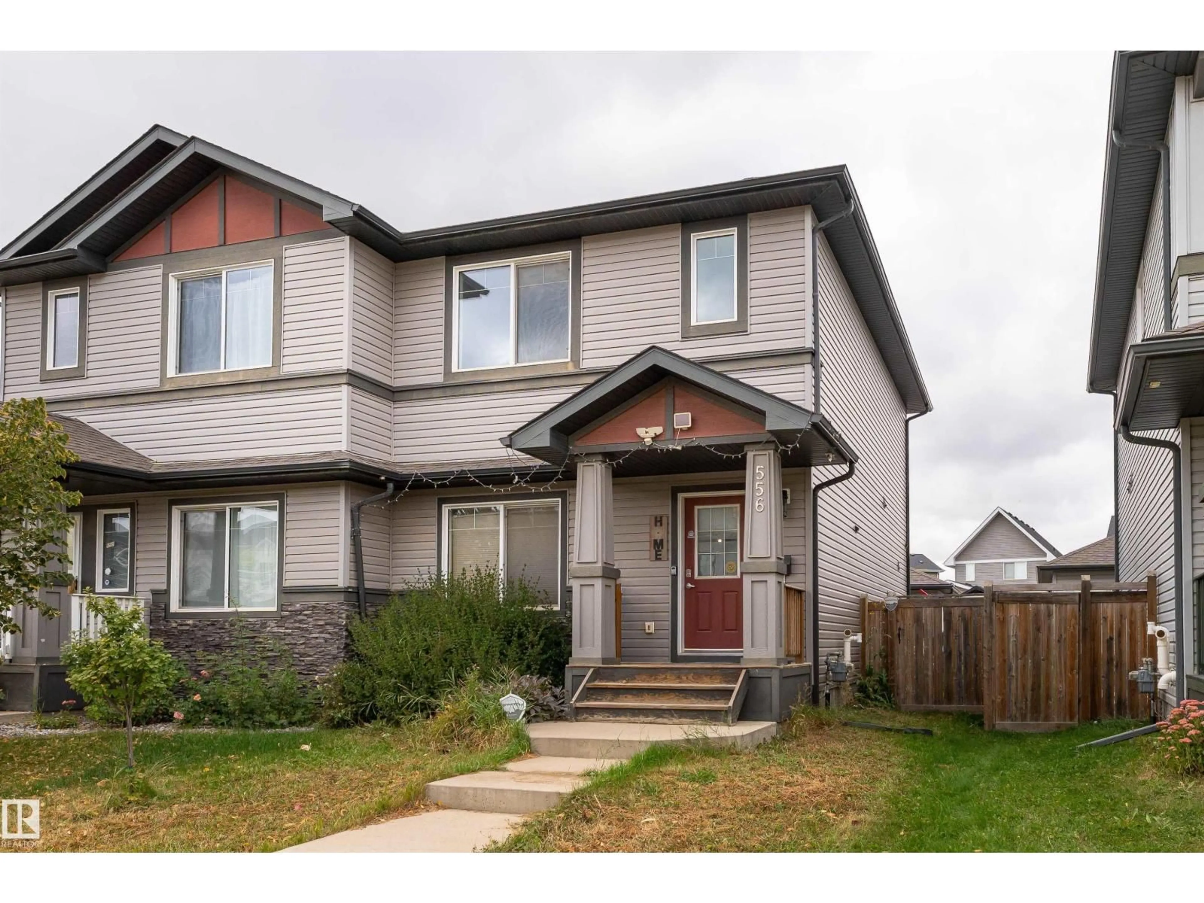 Home with vinyl exterior material, street for 556 SECORD BV, Edmonton Alberta T5T7B8