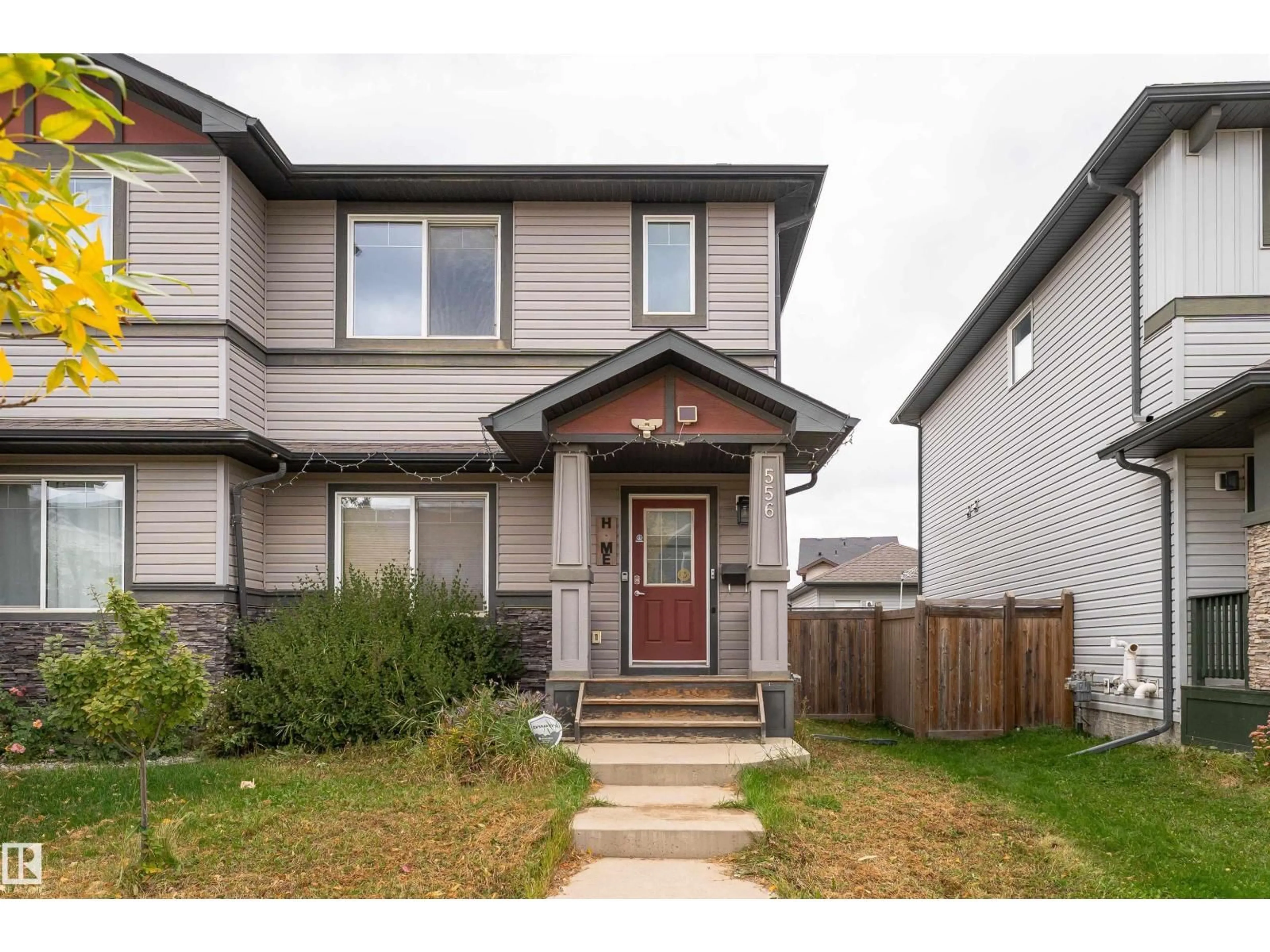 Home with vinyl exterior material, street for 556 SECORD BV, Edmonton Alberta T5T7B8
