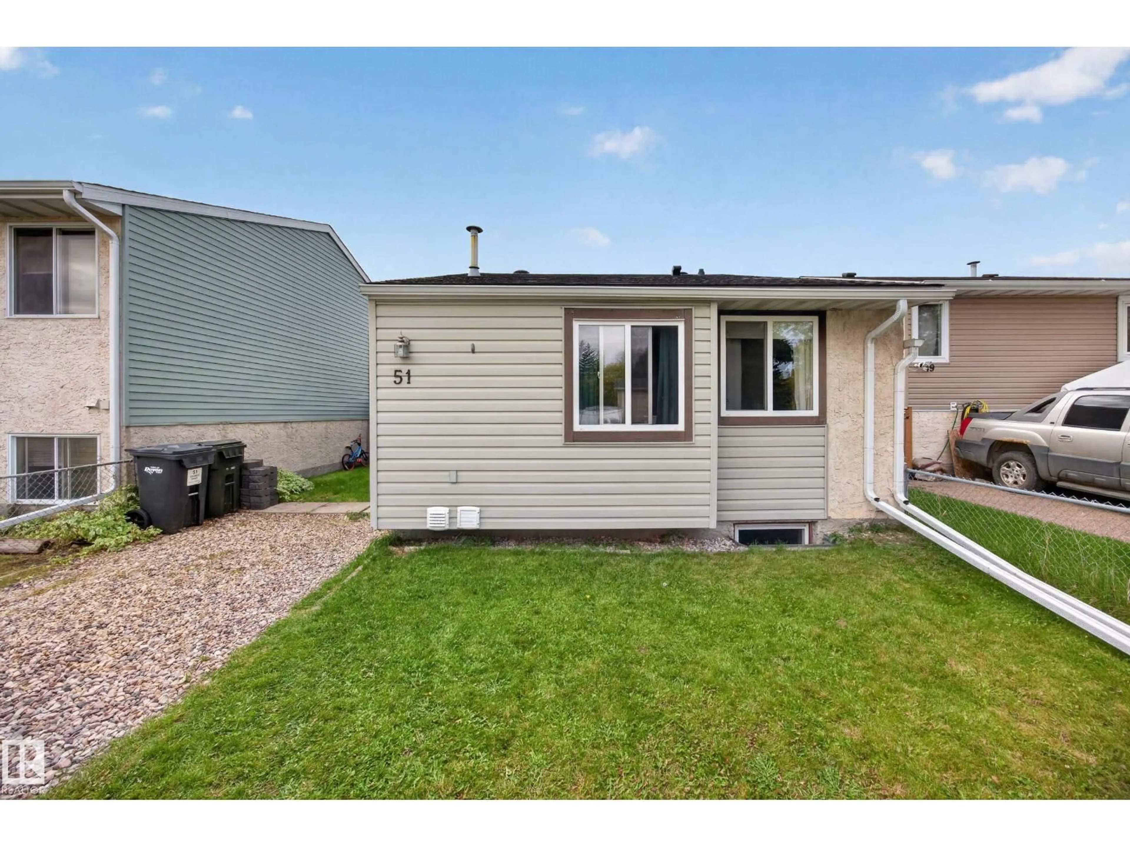 Home with vinyl exterior material, street for 51 CHUNGO DR, Devon Alberta T9G1T6