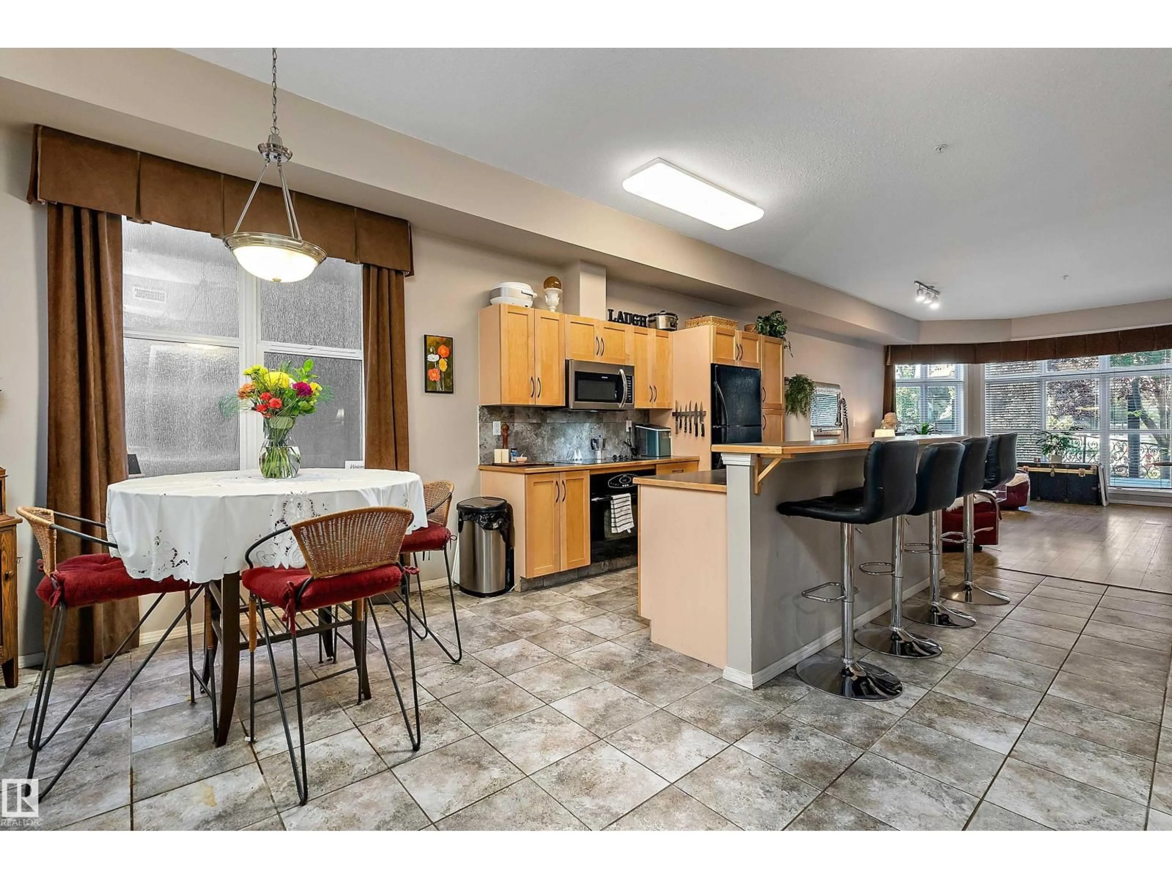 Open concept kitchen, ceramic/tile floor for 120 - 120 10407 122 ST NW, Edmonton Alberta T5N4B8