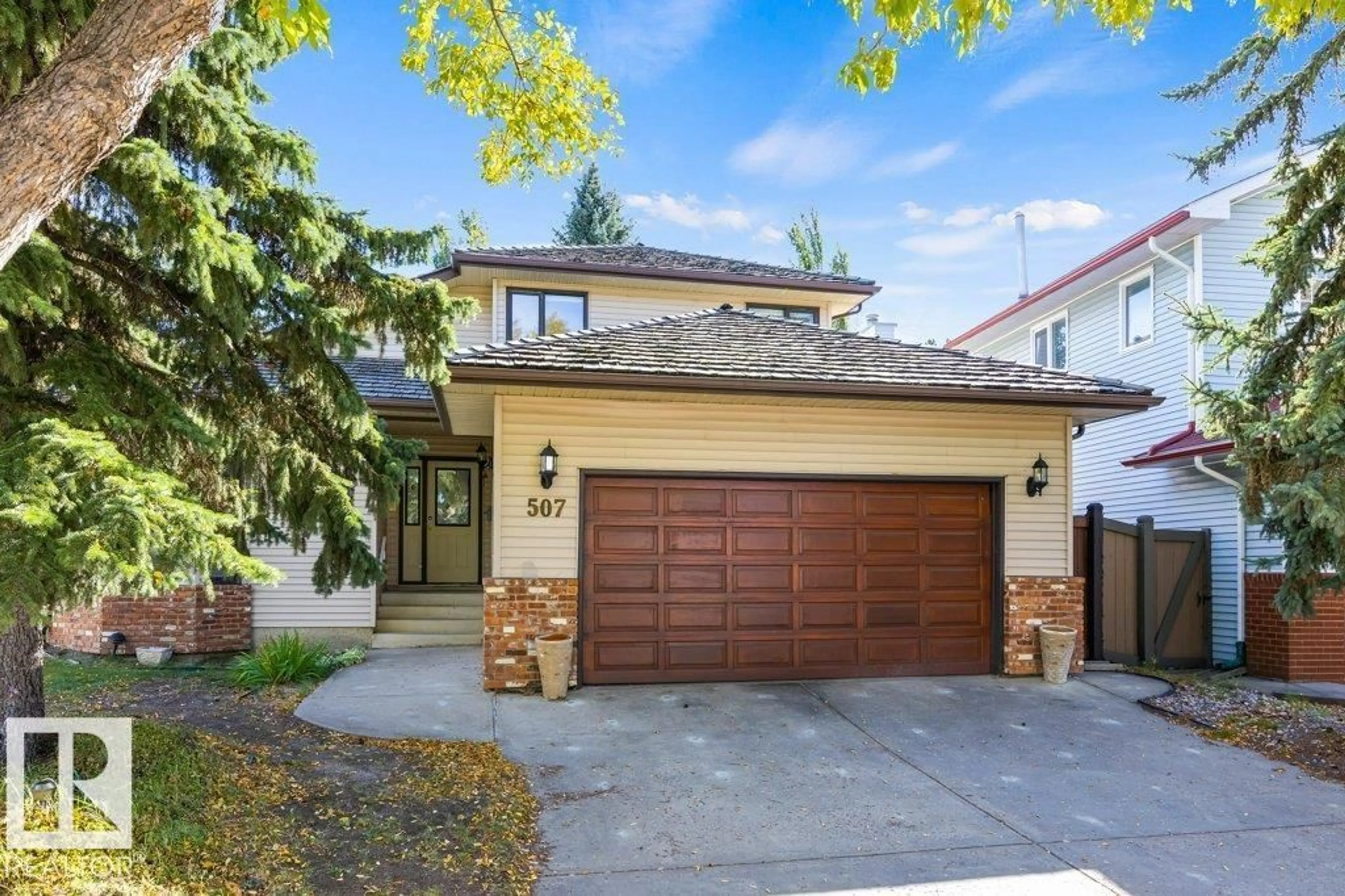 Home with vinyl exterior material, street for NW - 507 BURTON CL, Edmonton Alberta T6R2B2