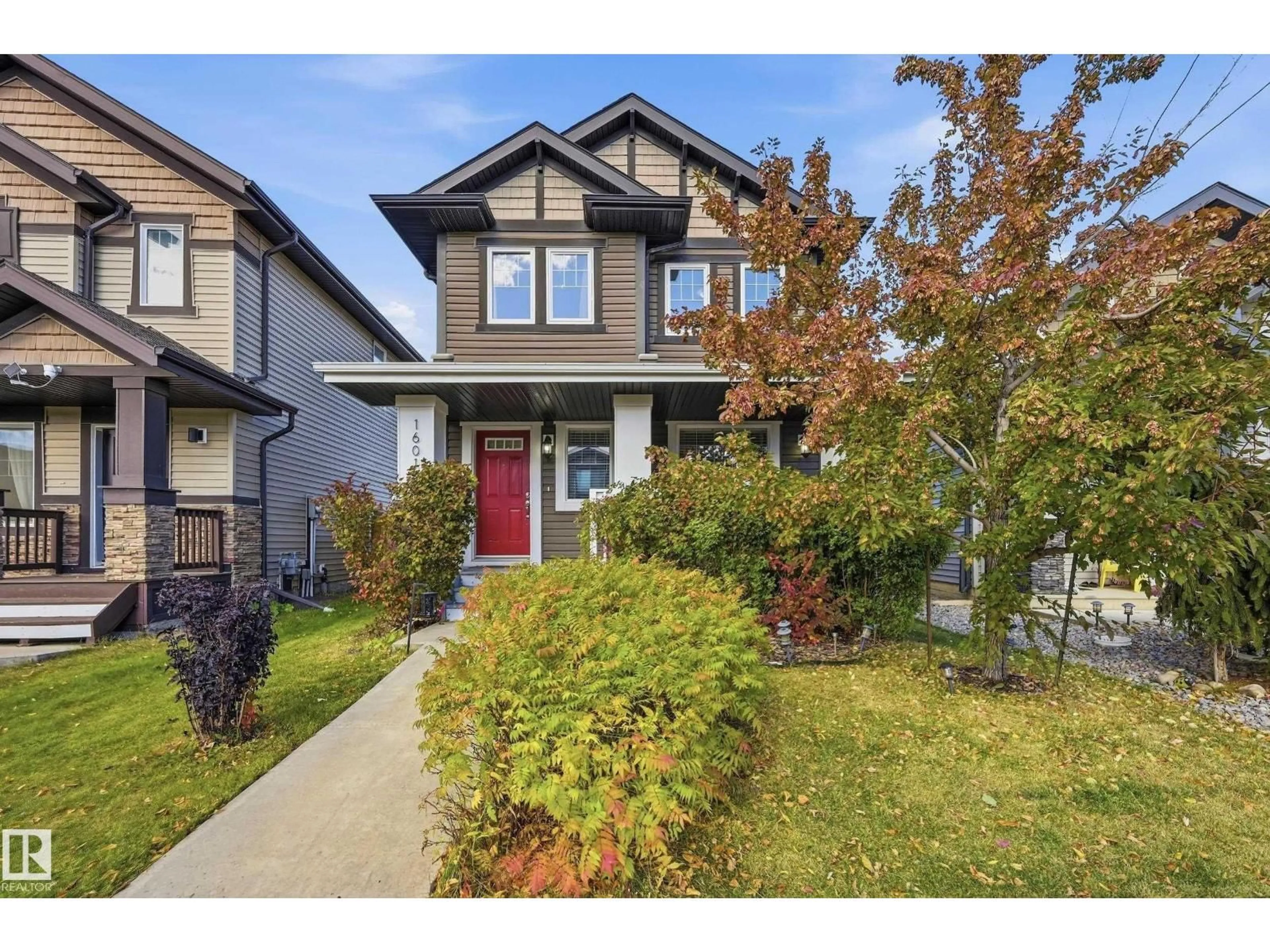 Home with vinyl exterior material, street for SW - 16012 11 AV, Edmonton Alberta T6W2H6