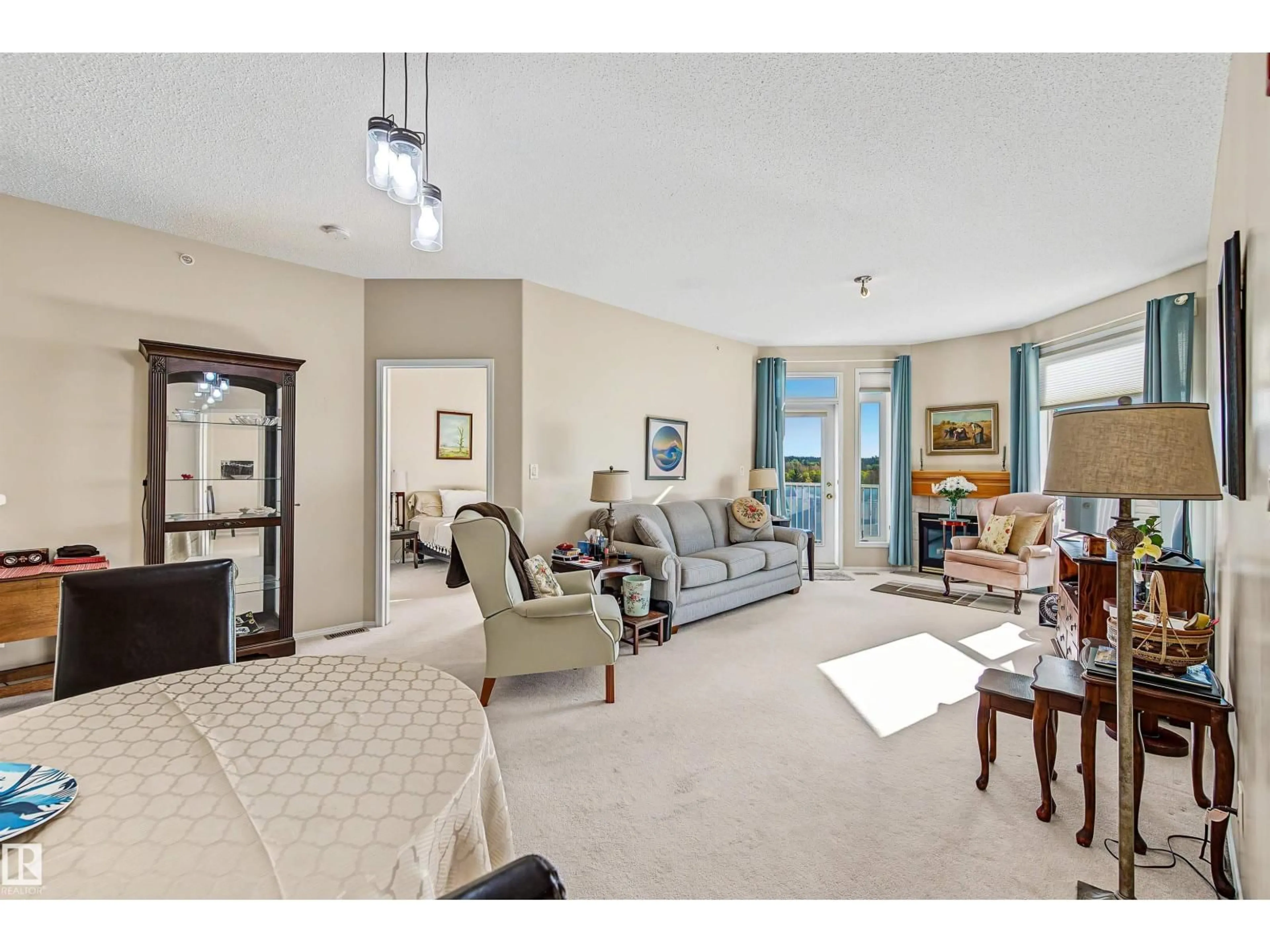 Living room with furniture, carpet floor for 411 IRONWOOD PT, St. Albert Alberta T8N6W4
