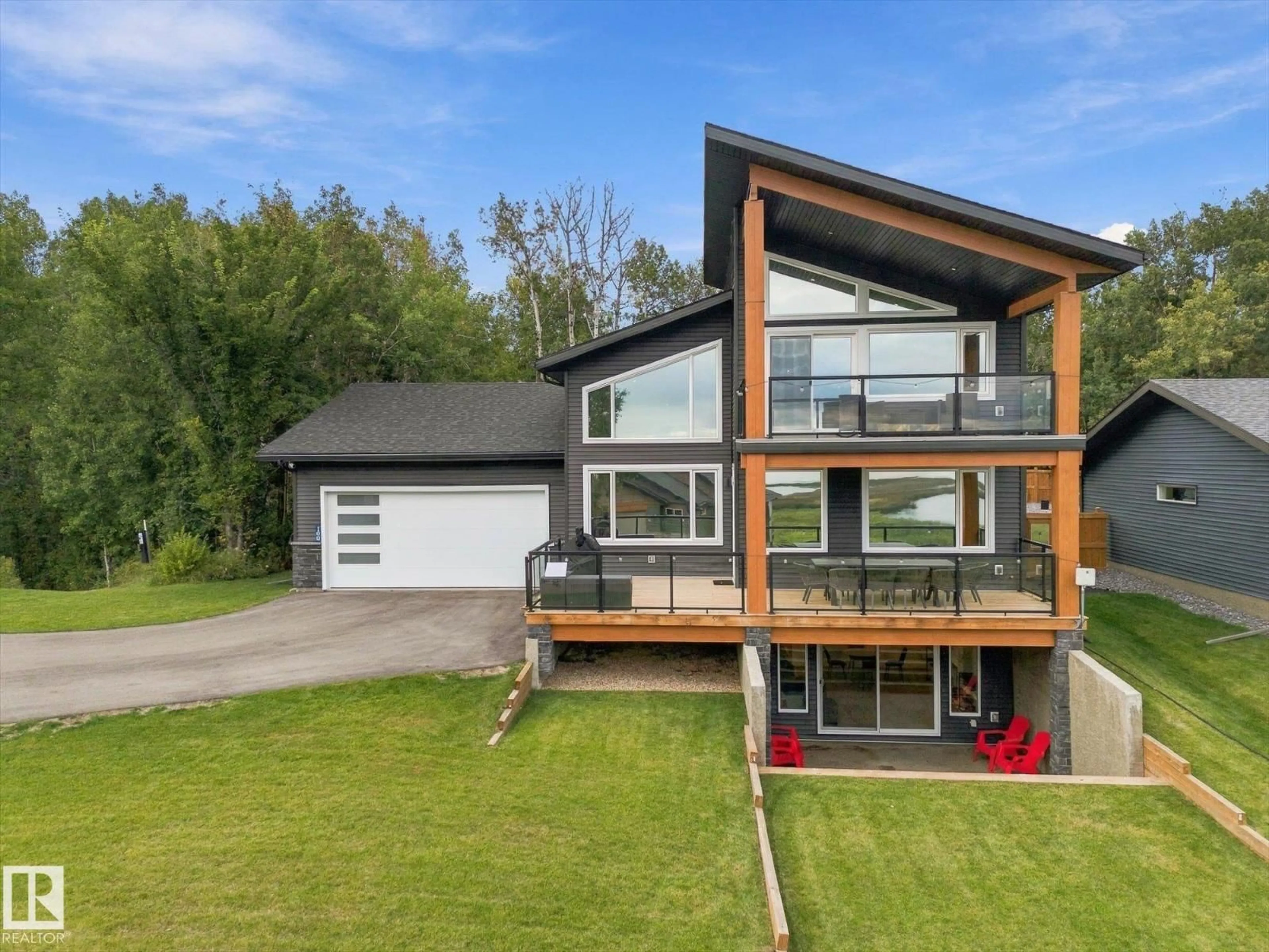 A pic from outside/outdoor area/front of a property/back of a property/a pic from drone, unknown for 100 55101 STE ANNE TRAIL, Rural Lac Ste. Anne County Alberta T0E1A1