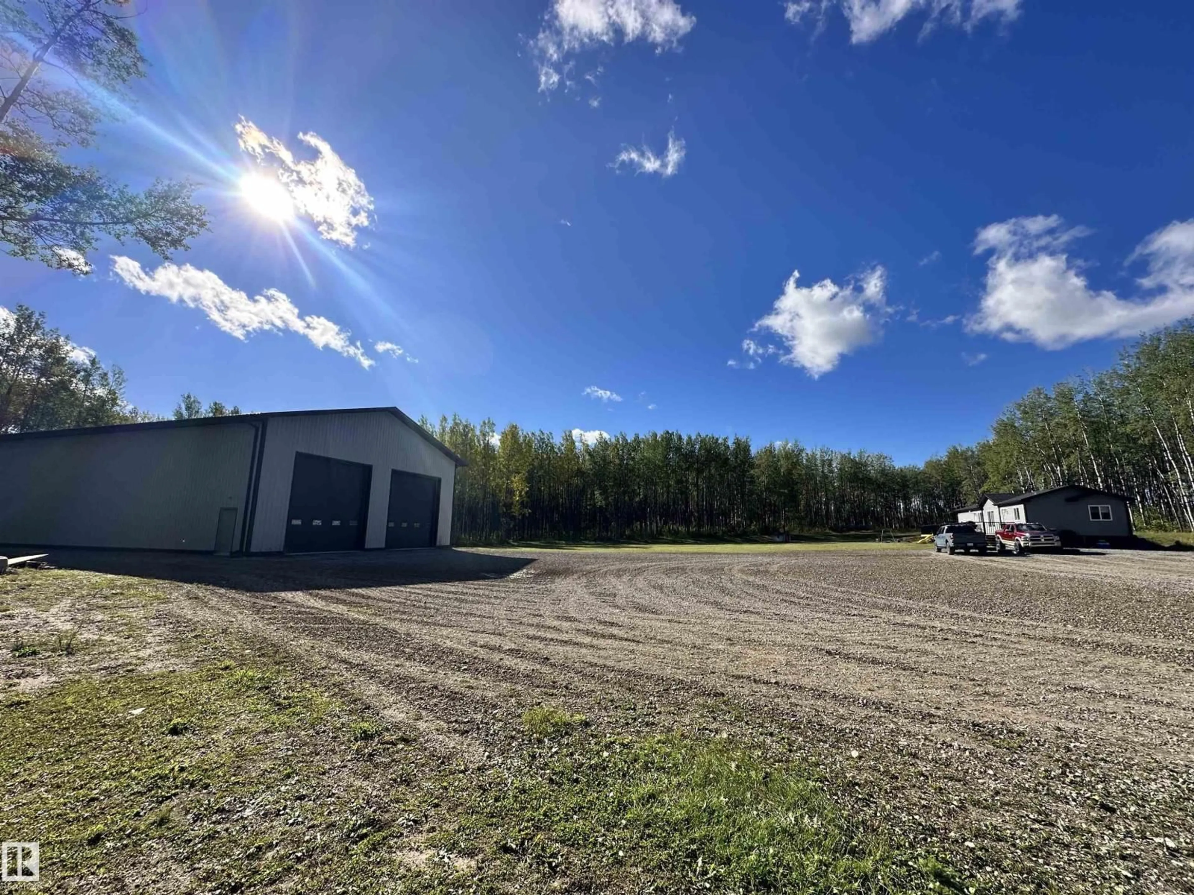 A pic from outside/outdoor area/front of a property/back of a property/a pic from drone, building for 7323 TWP ROAD 512, Rural Parkland County Alberta T7A1A2