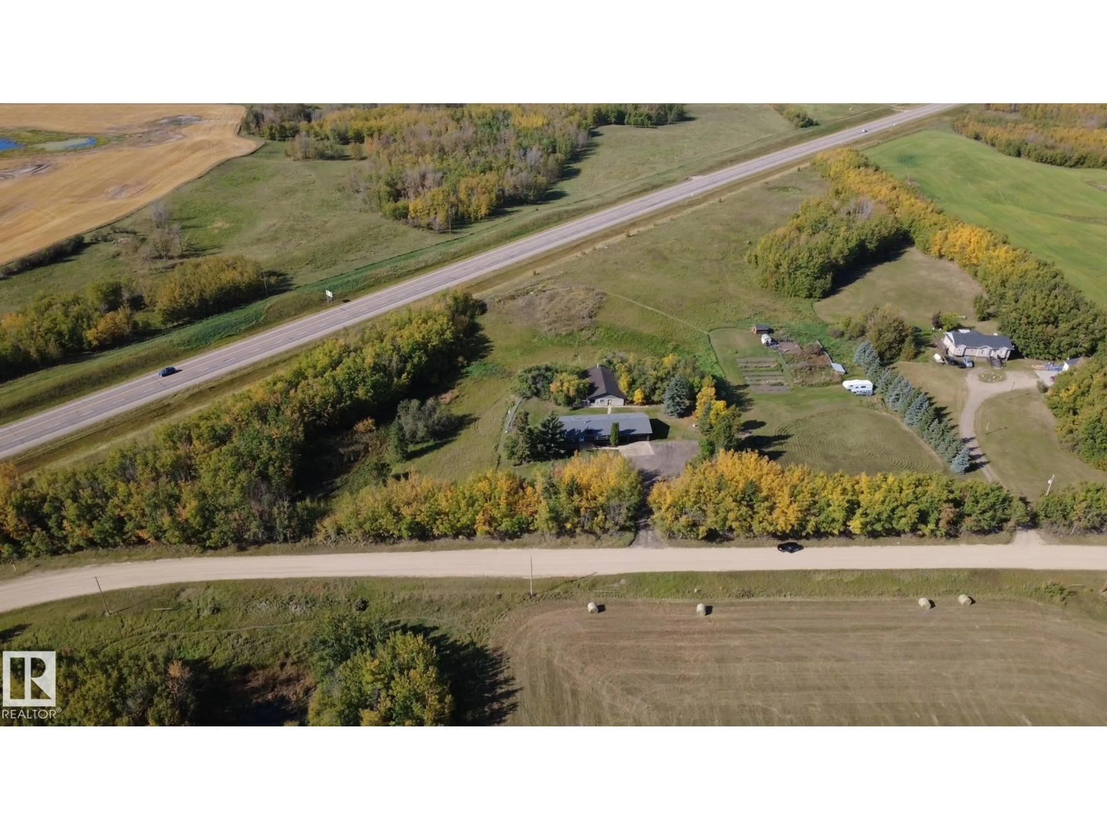 A pic from outside/outdoor area/front of a property/back of a property/a pic from drone, street for 50034 RGE RD 225, Rural Leduc County Alberta T0B3M3