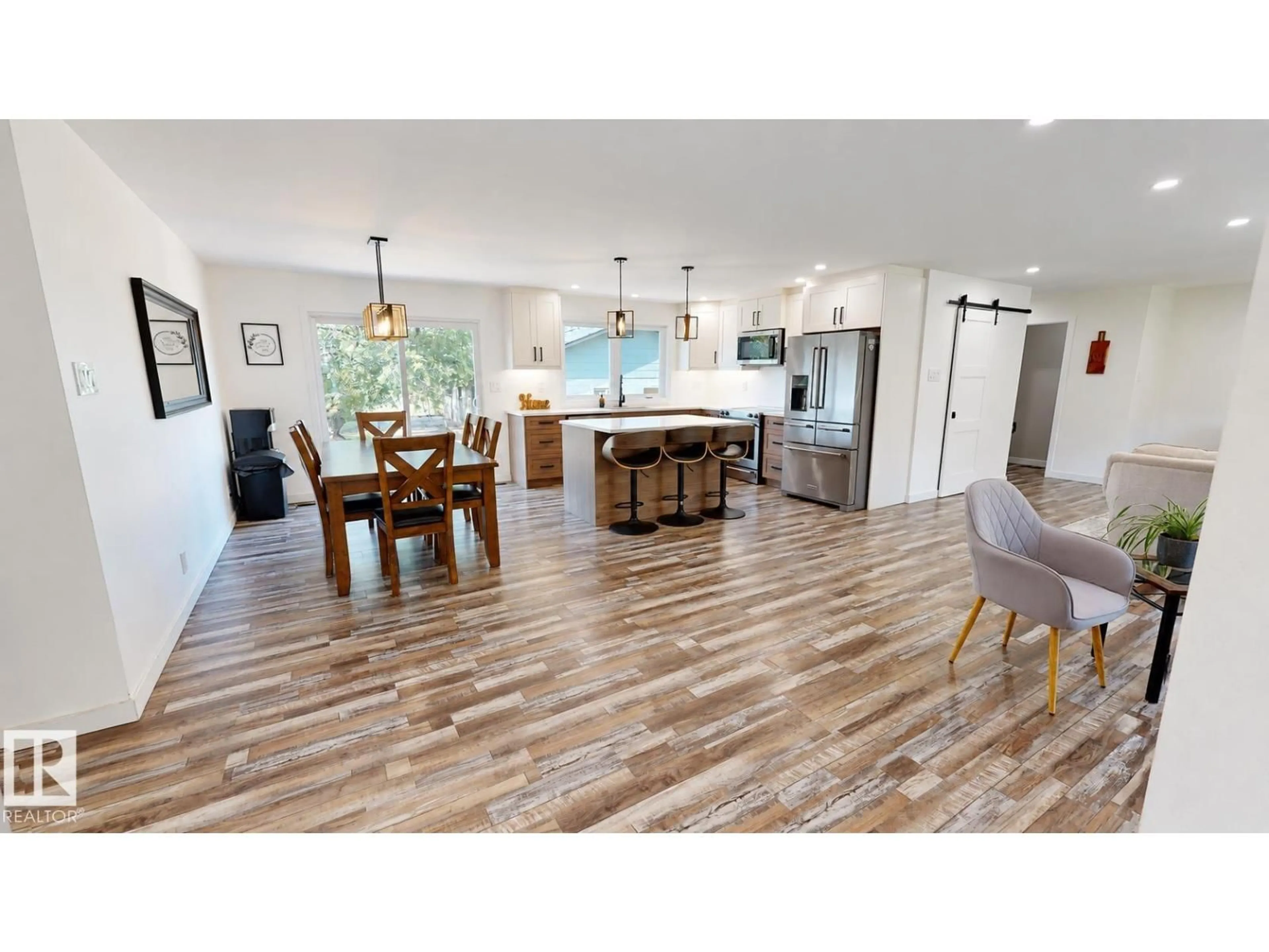 Open concept kitchen, wood/laminate floor for 50034 RGE RD 225, Rural Leduc County Alberta T0B3M3