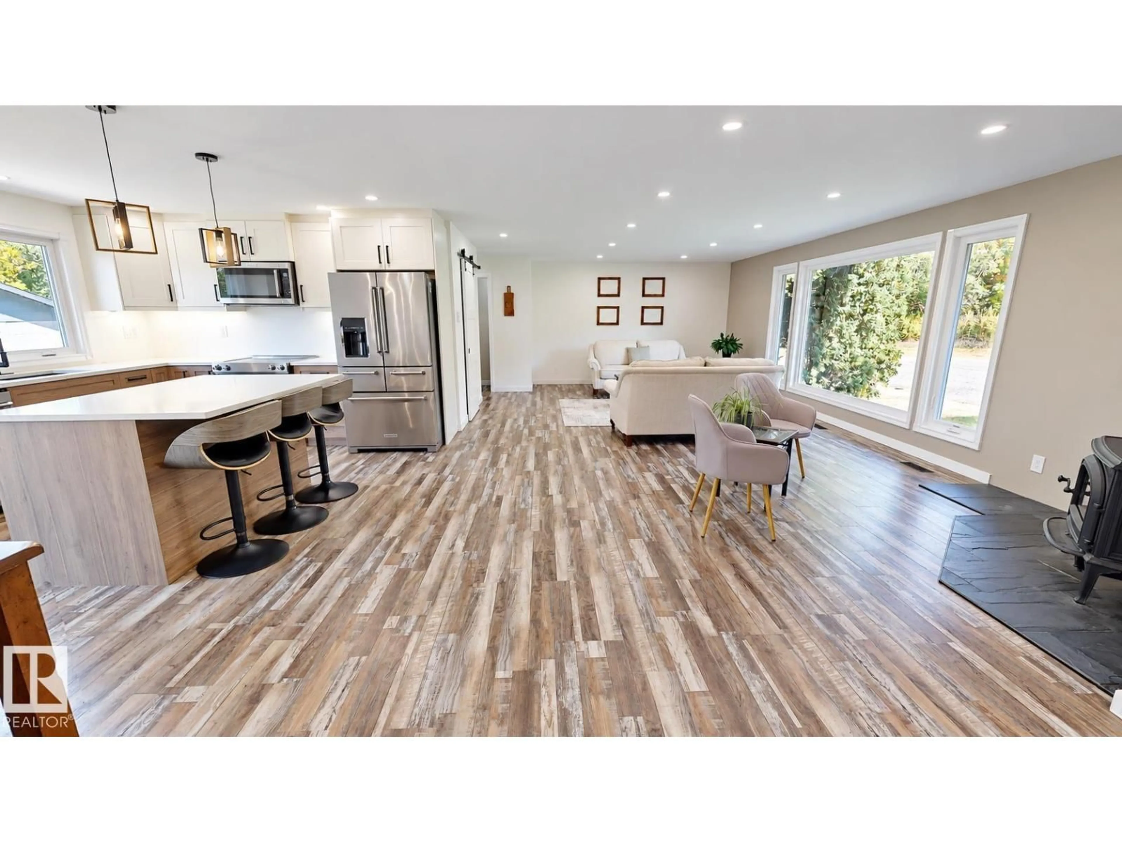 Open concept kitchen, wood/laminate floor for 50034 RGE RD 225, Rural Leduc County Alberta T0B3M3