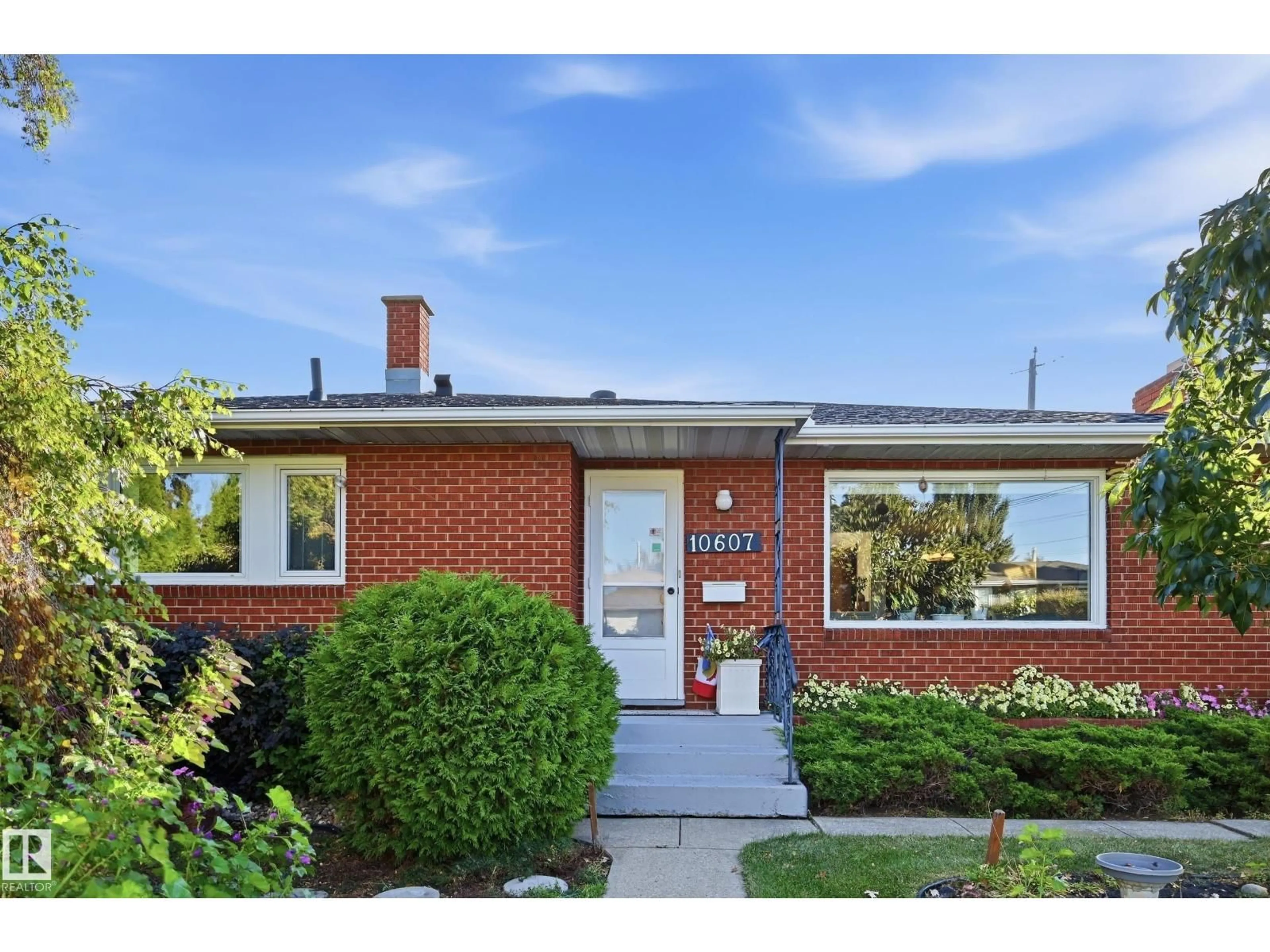Home with brick exterior material, street for 10607 74 ST, Edmonton Alberta T6A2Y6