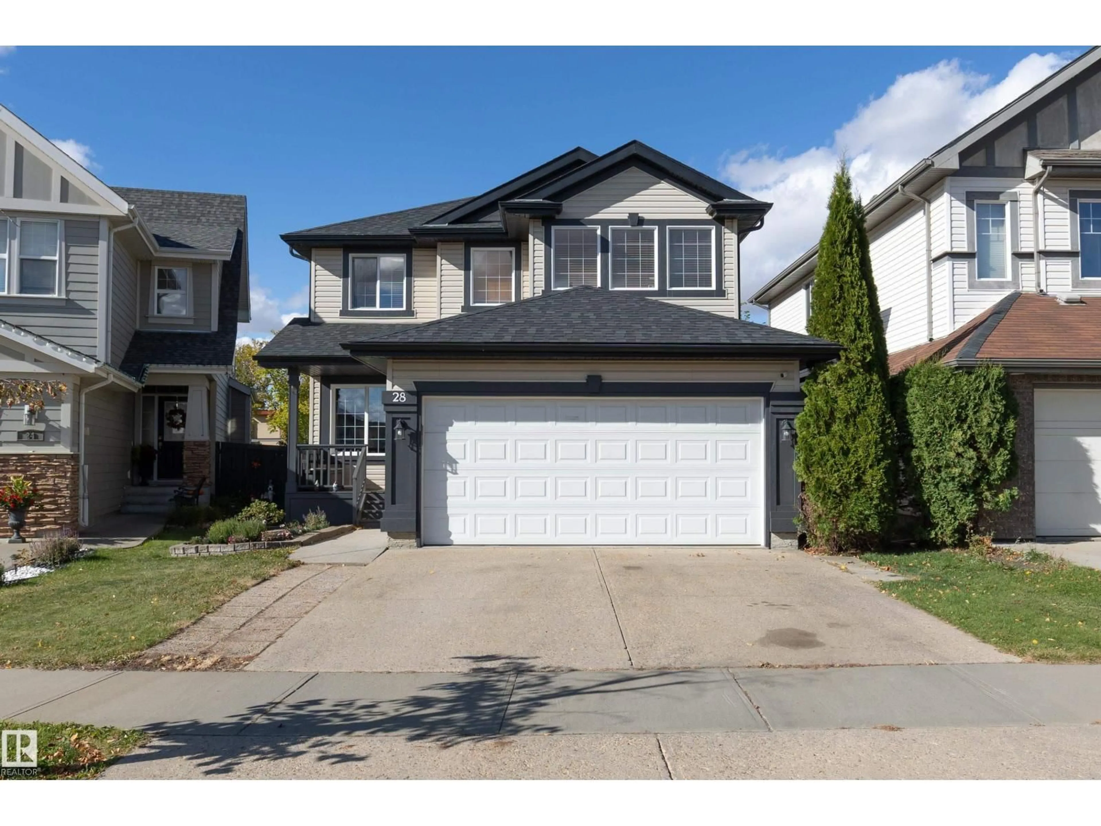 Home with vinyl exterior material, street for 28 BECKER CR, Fort Saskatchewan Alberta T8L0C1