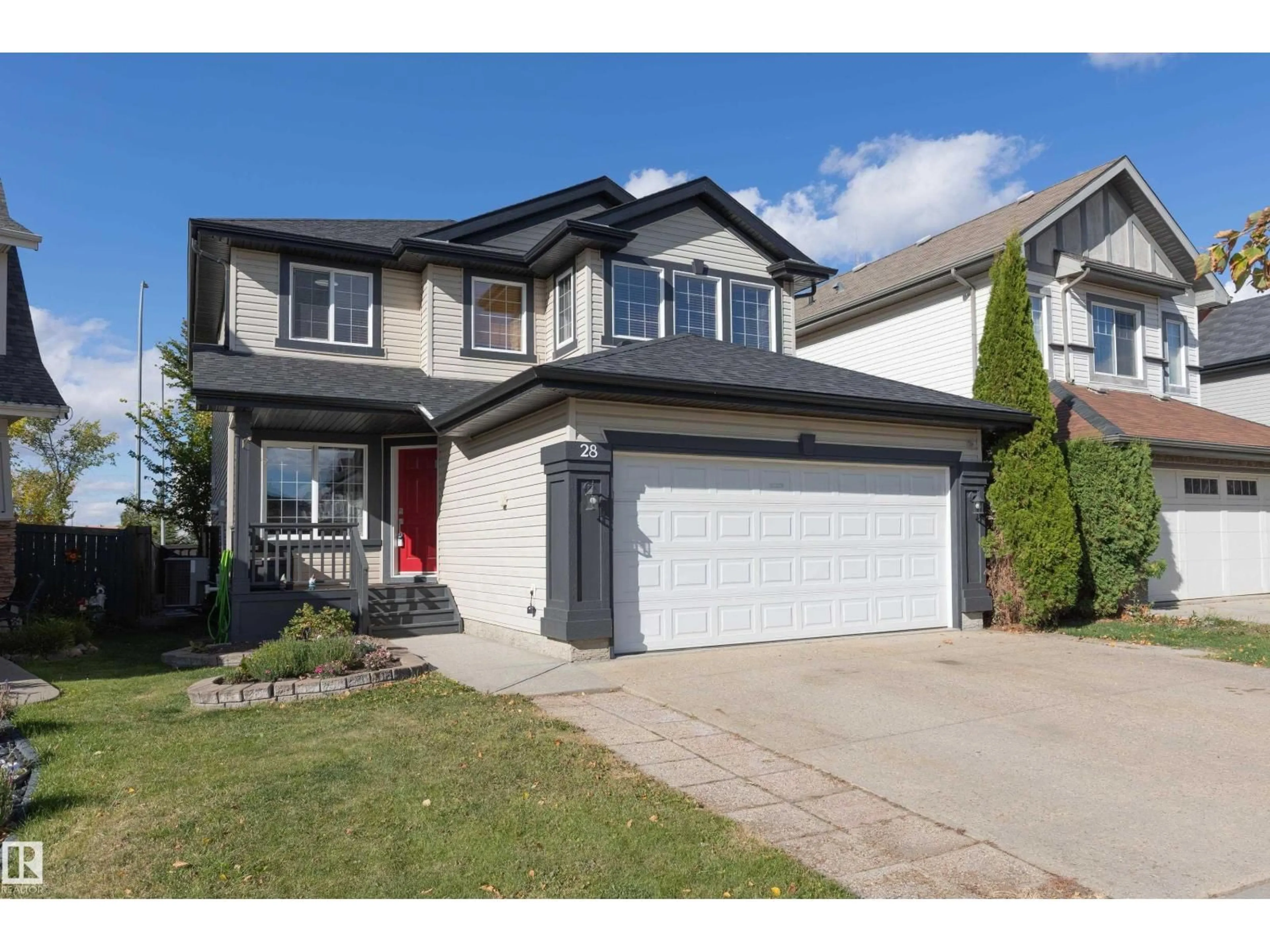Home with vinyl exterior material, street for 28 BECKER CR, Fort Saskatchewan Alberta T8L0C1