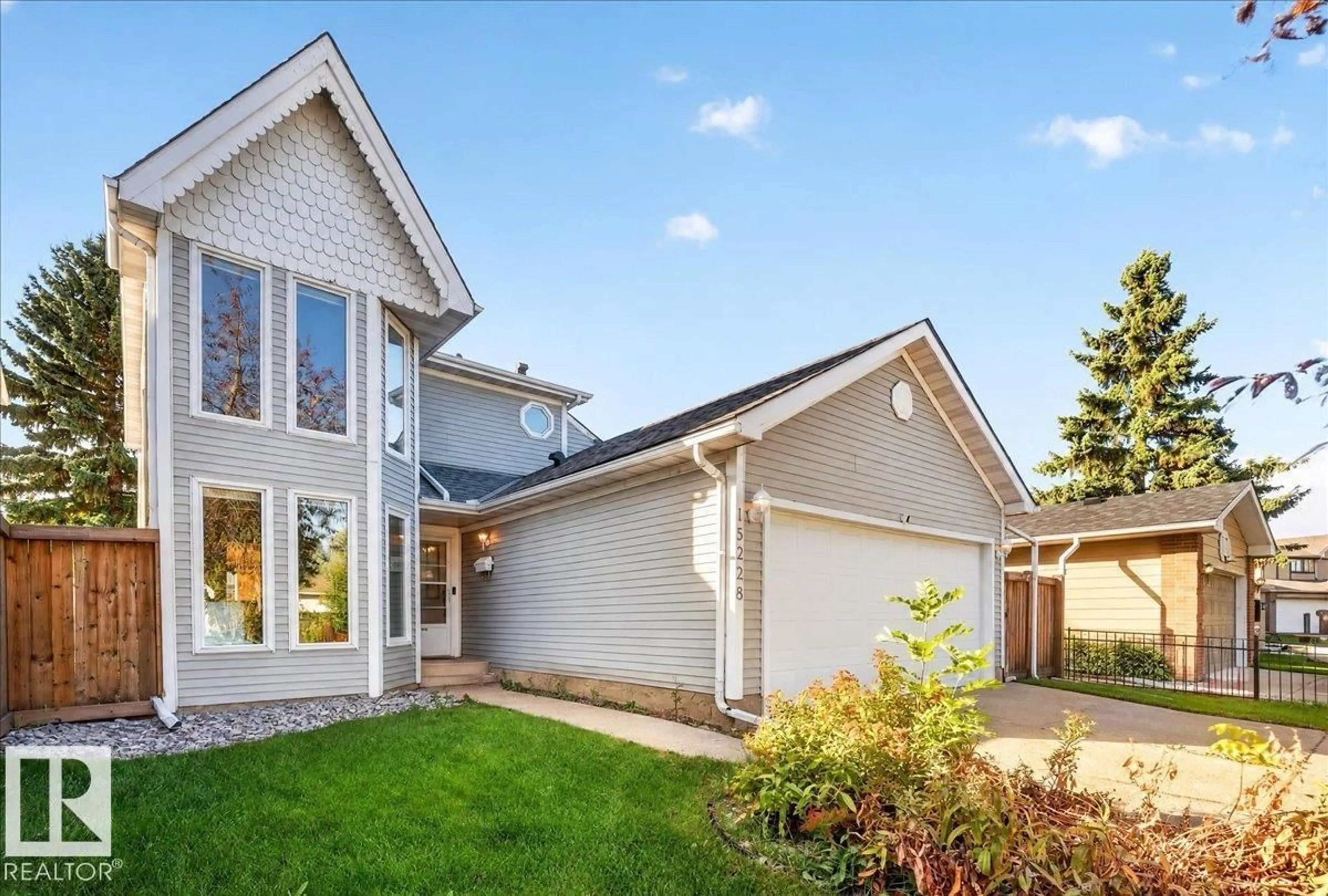 Home with vinyl exterior material, street for NW - 15228 84 ST, Edmonton Alberta T5E6G4