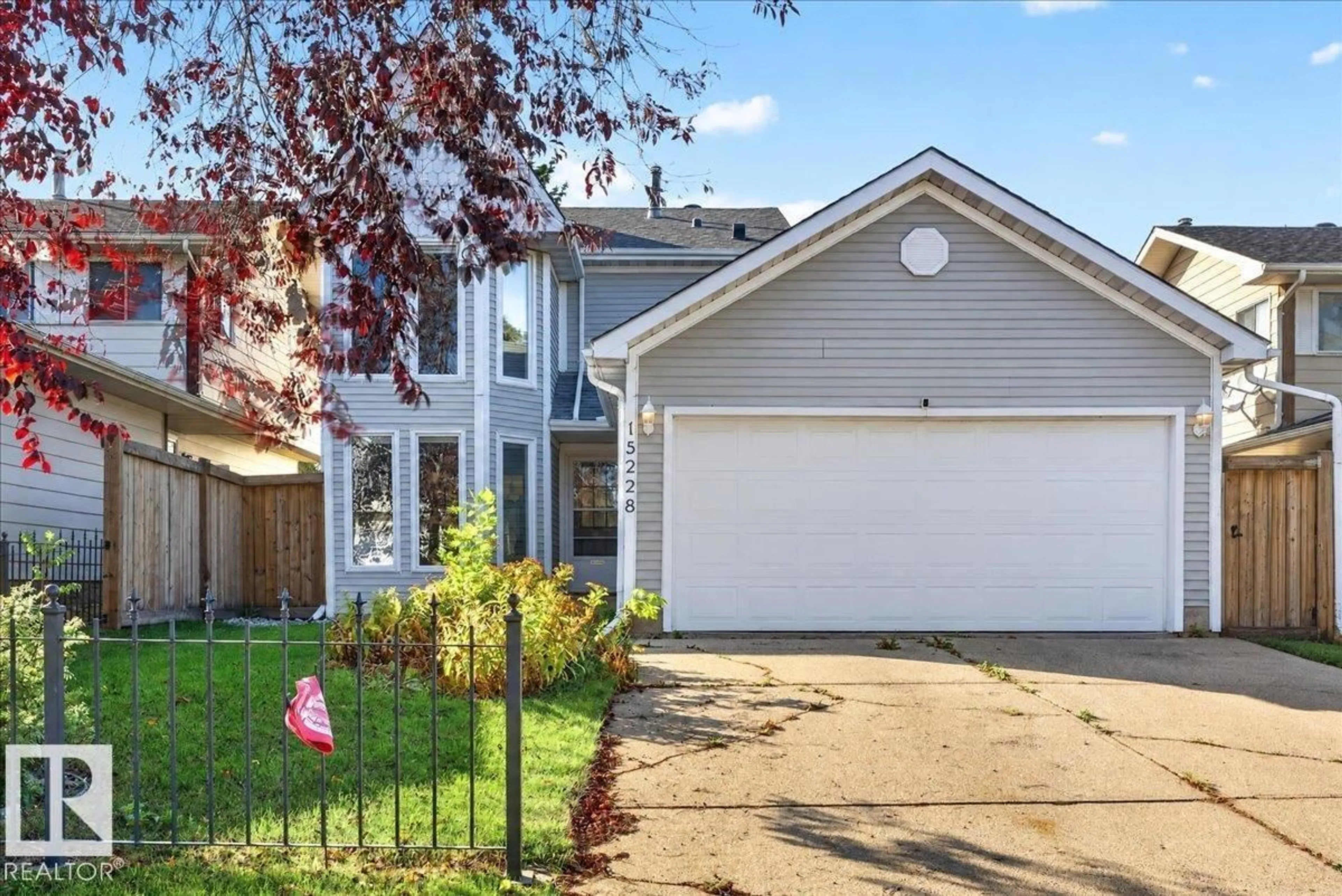 Home with vinyl exterior material, street for NW - 15228 84 ST, Edmonton Alberta T5E6G4