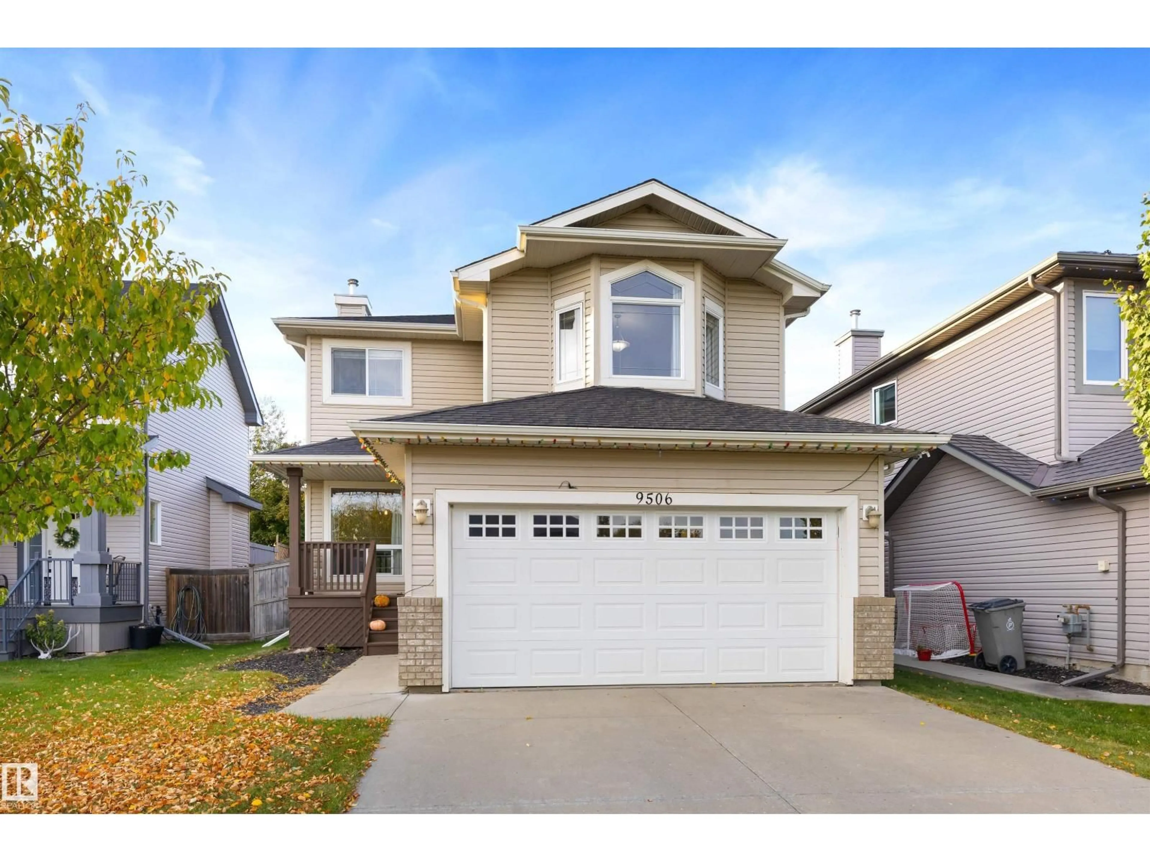Home with vinyl exterior material, street for 9506 83 AV, Morinville Alberta T8R0A8