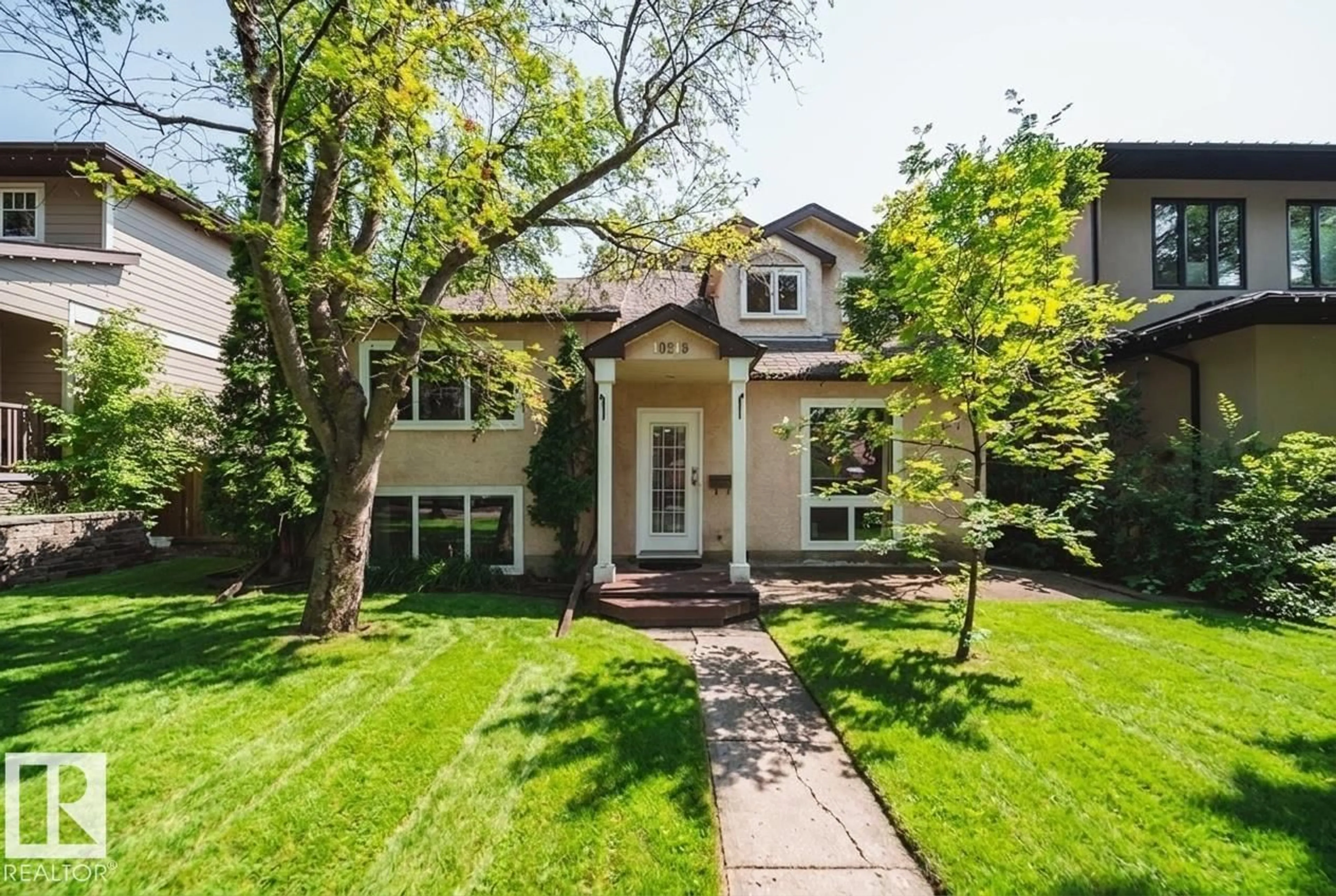 Home with brick exterior material, street for NW - 10519 140 ST, Edmonton Alberta T5N2M1