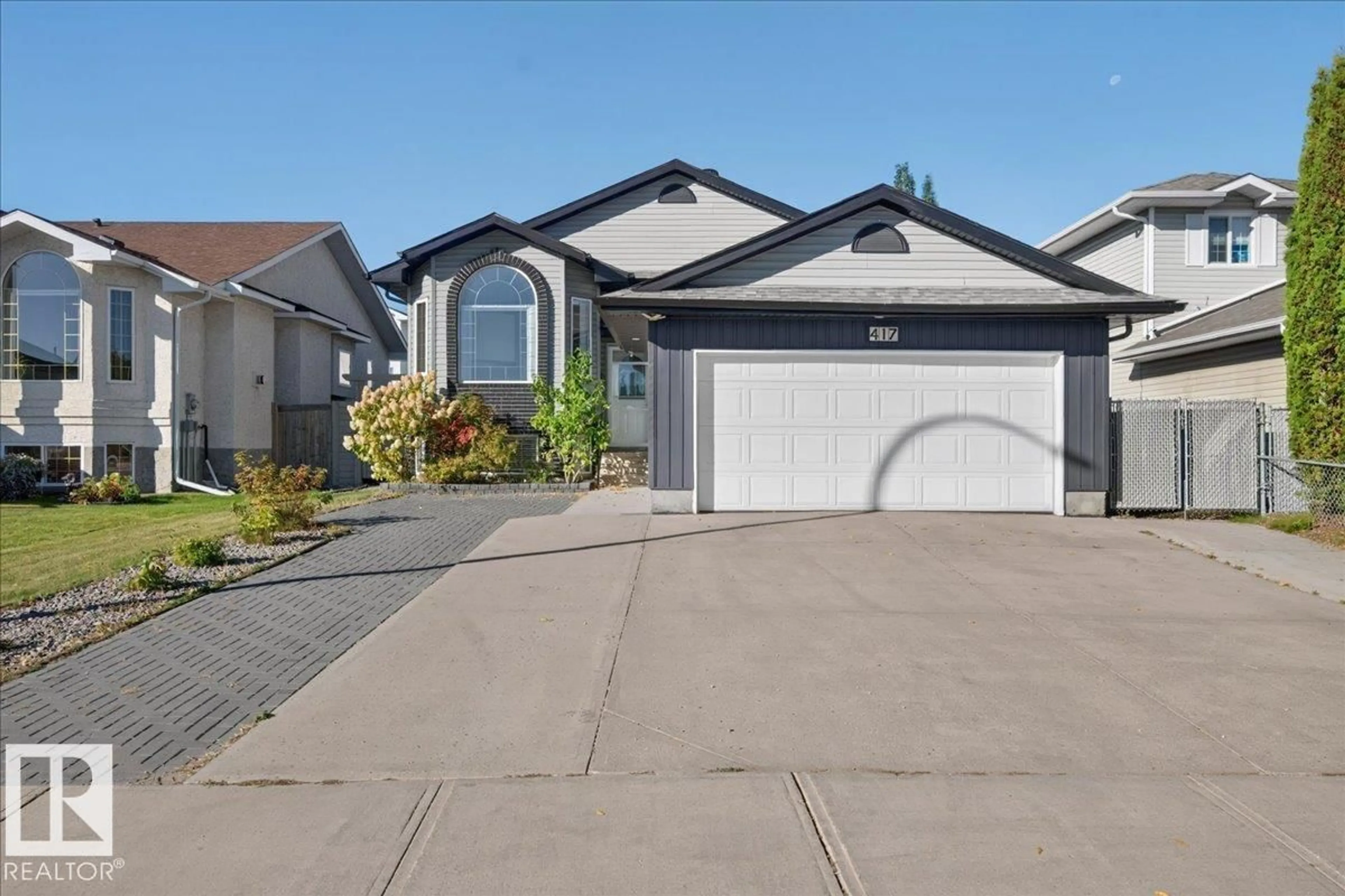 Home with vinyl exterior material, street for 417 HOLLICK KENYON RD, Edmonton Alberta T5Y2T9