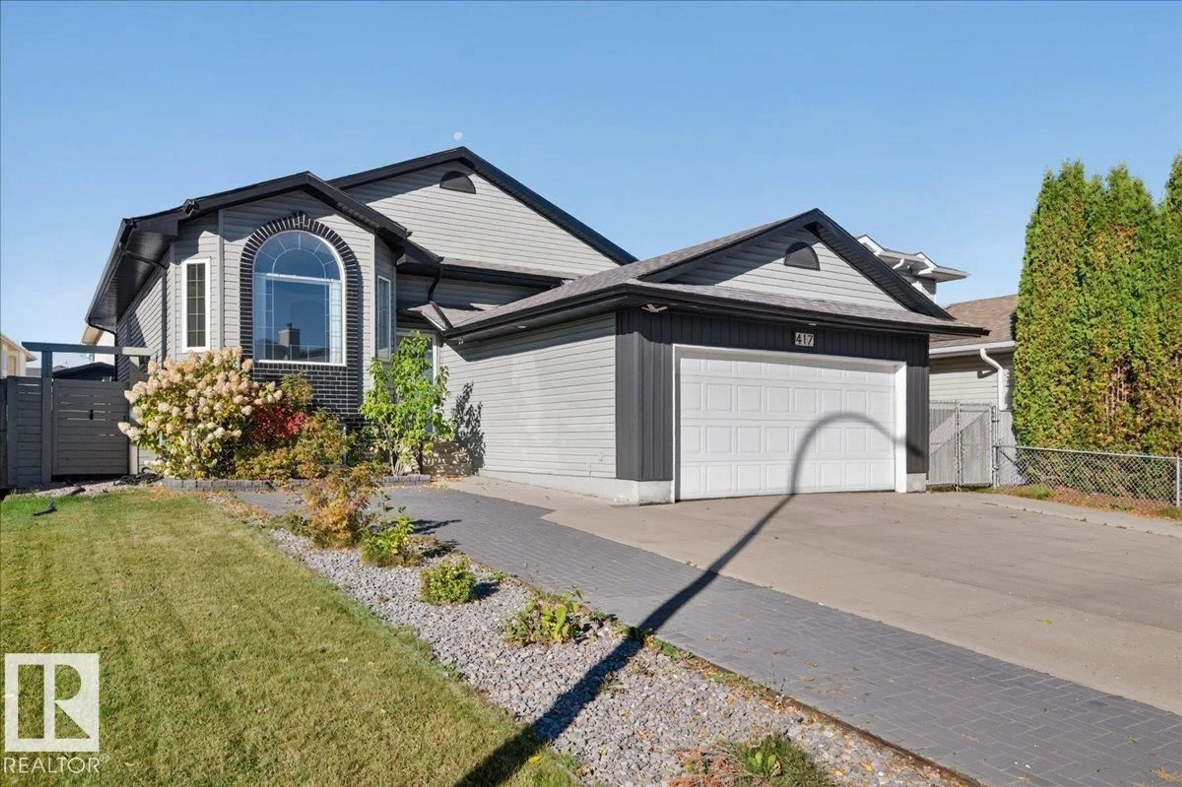 Home with vinyl exterior material, street for 417 HOLLICK KENYON RD, Edmonton Alberta T5Y2T9