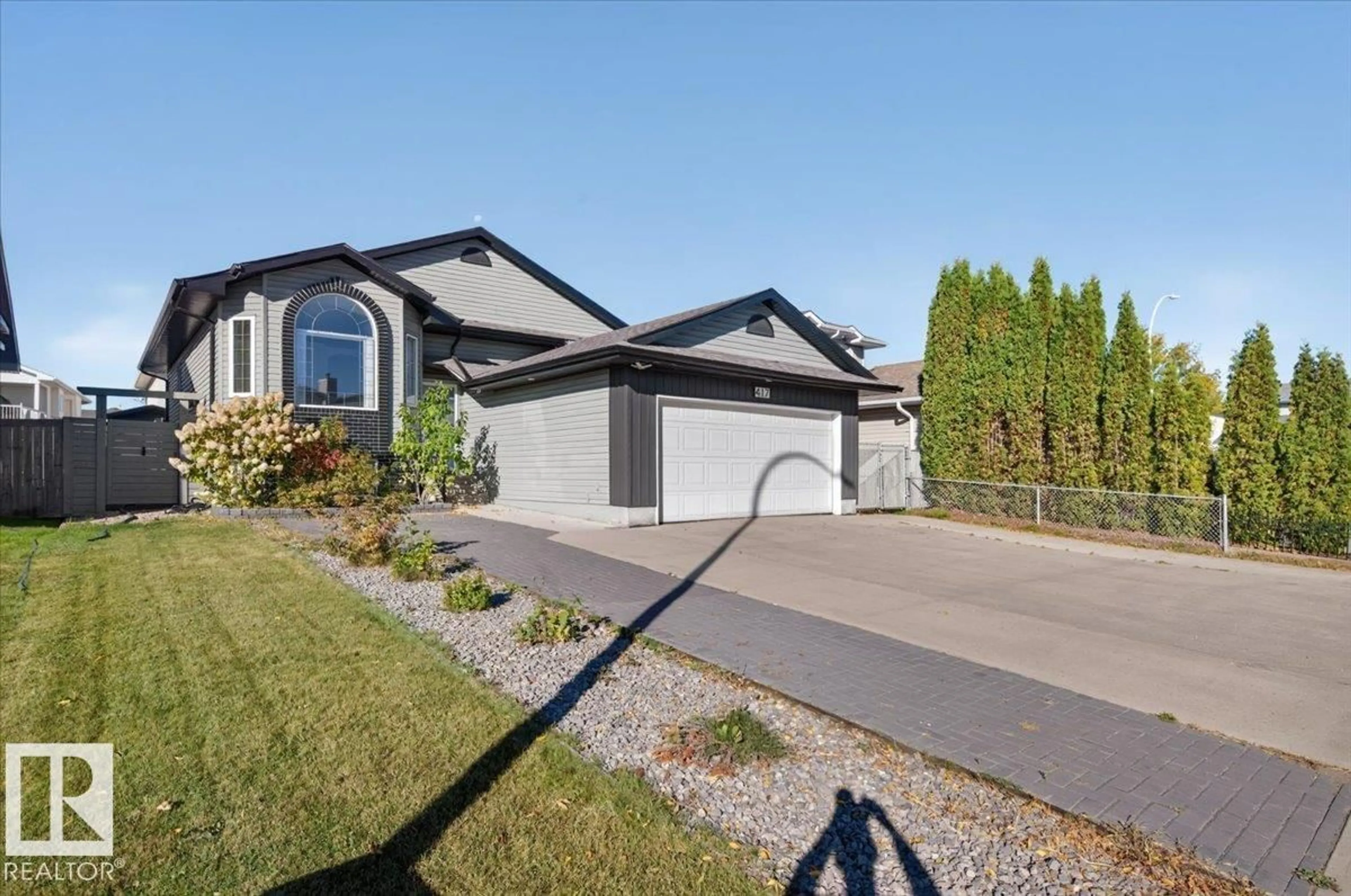 Home with vinyl exterior material, street for 417 HOLLICK KENYON RD, Edmonton Alberta T5Y2T9