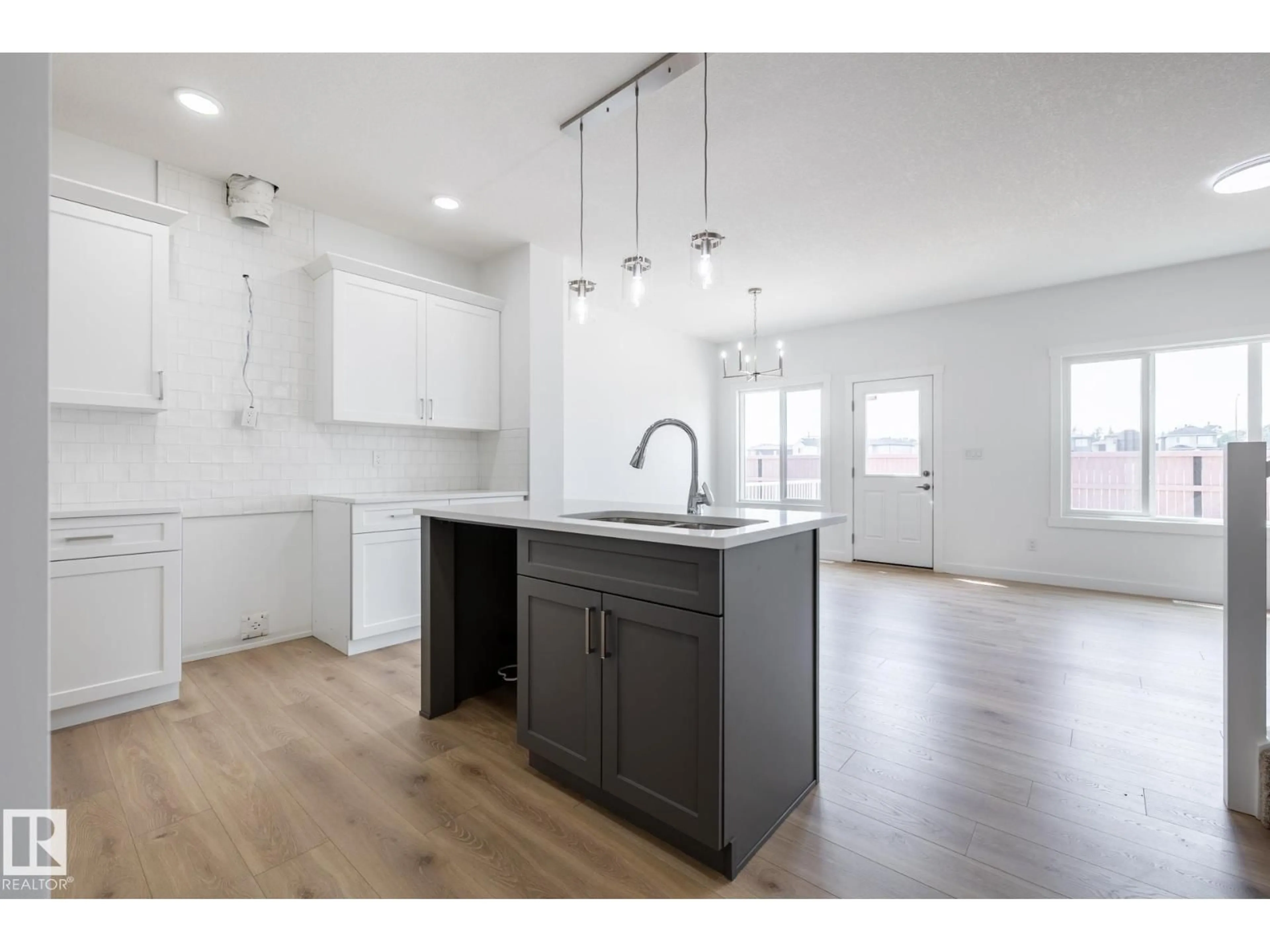 Open concept kitchen, unknown for NW - 3036 197 ST, Edmonton Alberta T6M3L9