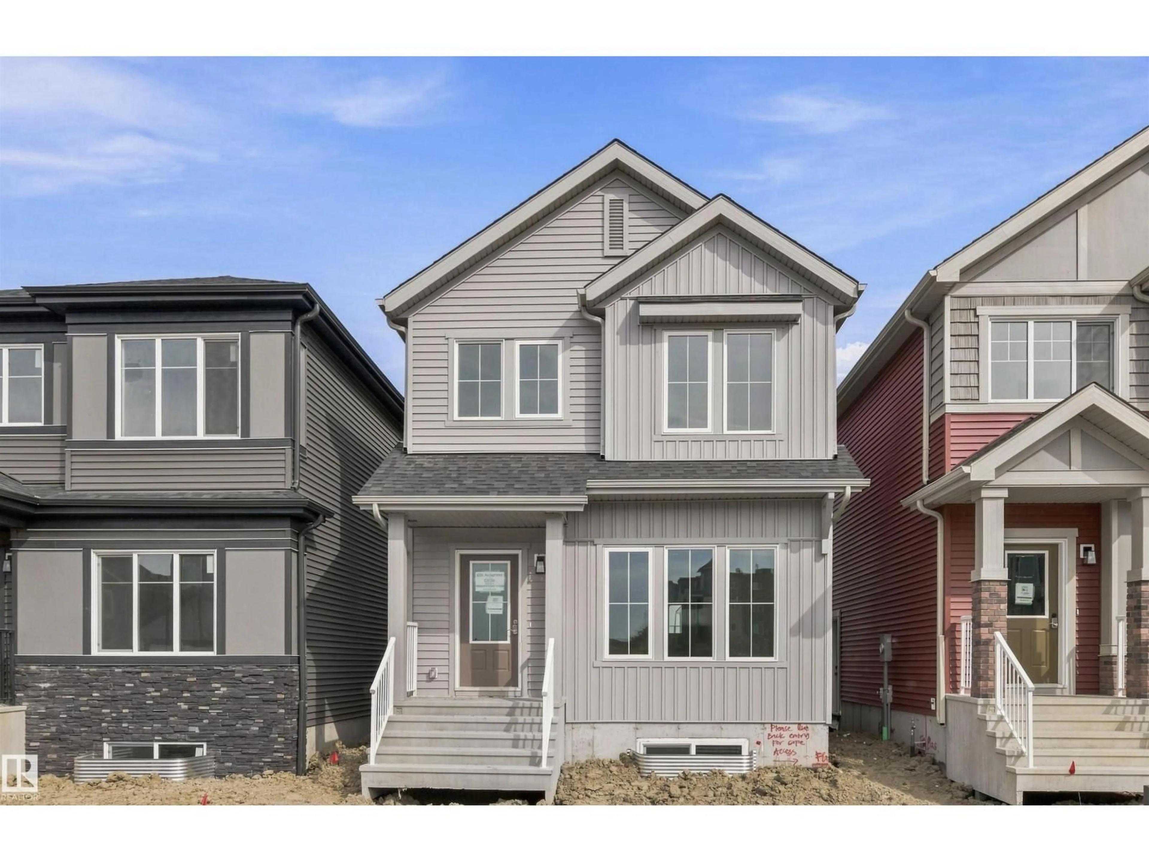 Home with vinyl exterior material, street for 606 ASHGROVE CI, Leduc Alberta T9E0K8