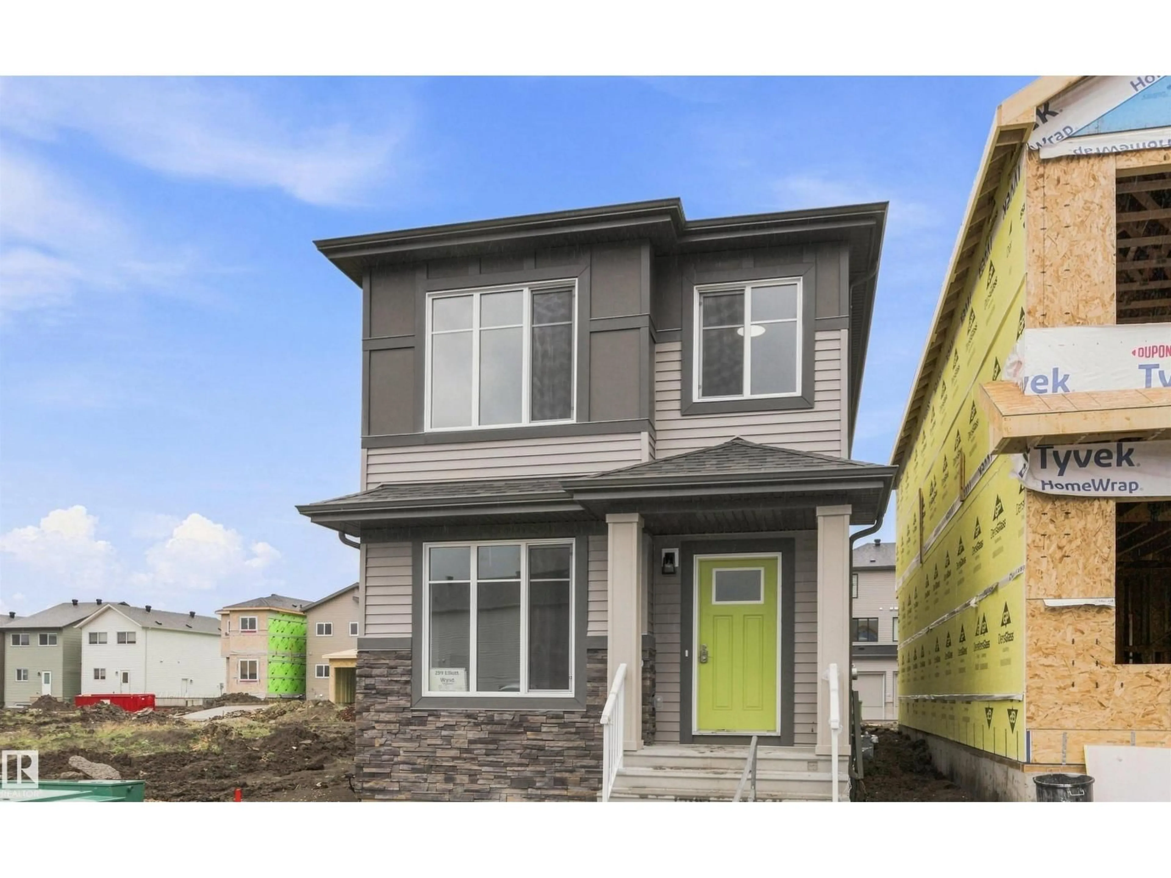 Home with vinyl exterior material, street for 299 ELLIOTT WD, Fort Saskatchewan Alberta T8L4E8